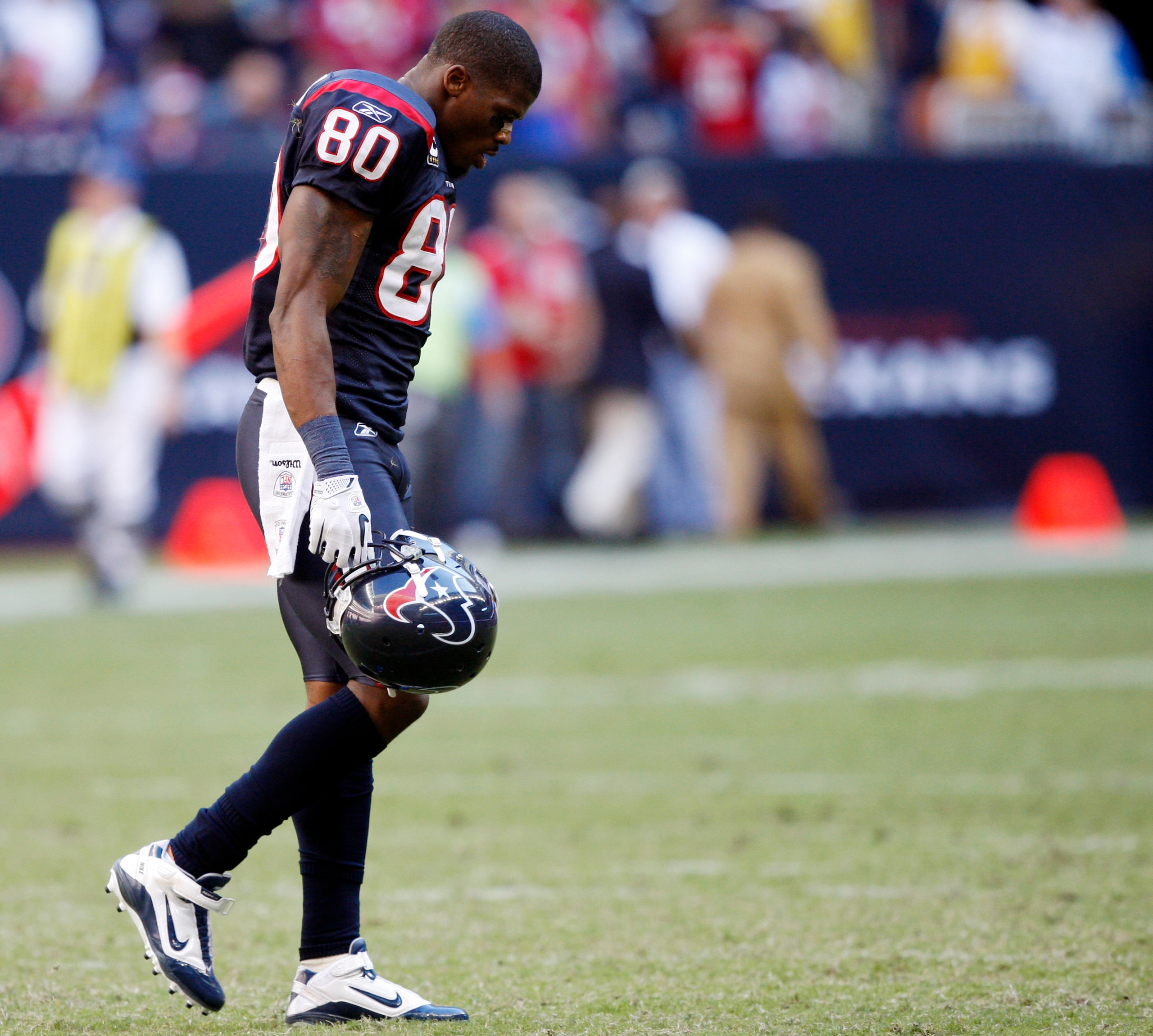 HOUSTON - NOVEMBER 07:  Wide receiver Andre Johnson #80 walks off the field after losing control of a pass that was intercepted by San Diego Charger Paul Oliver at Reliant Stadium on November 7, 2010 in Houston, Texas.  (Photo by Bob Levey/Getty Images)