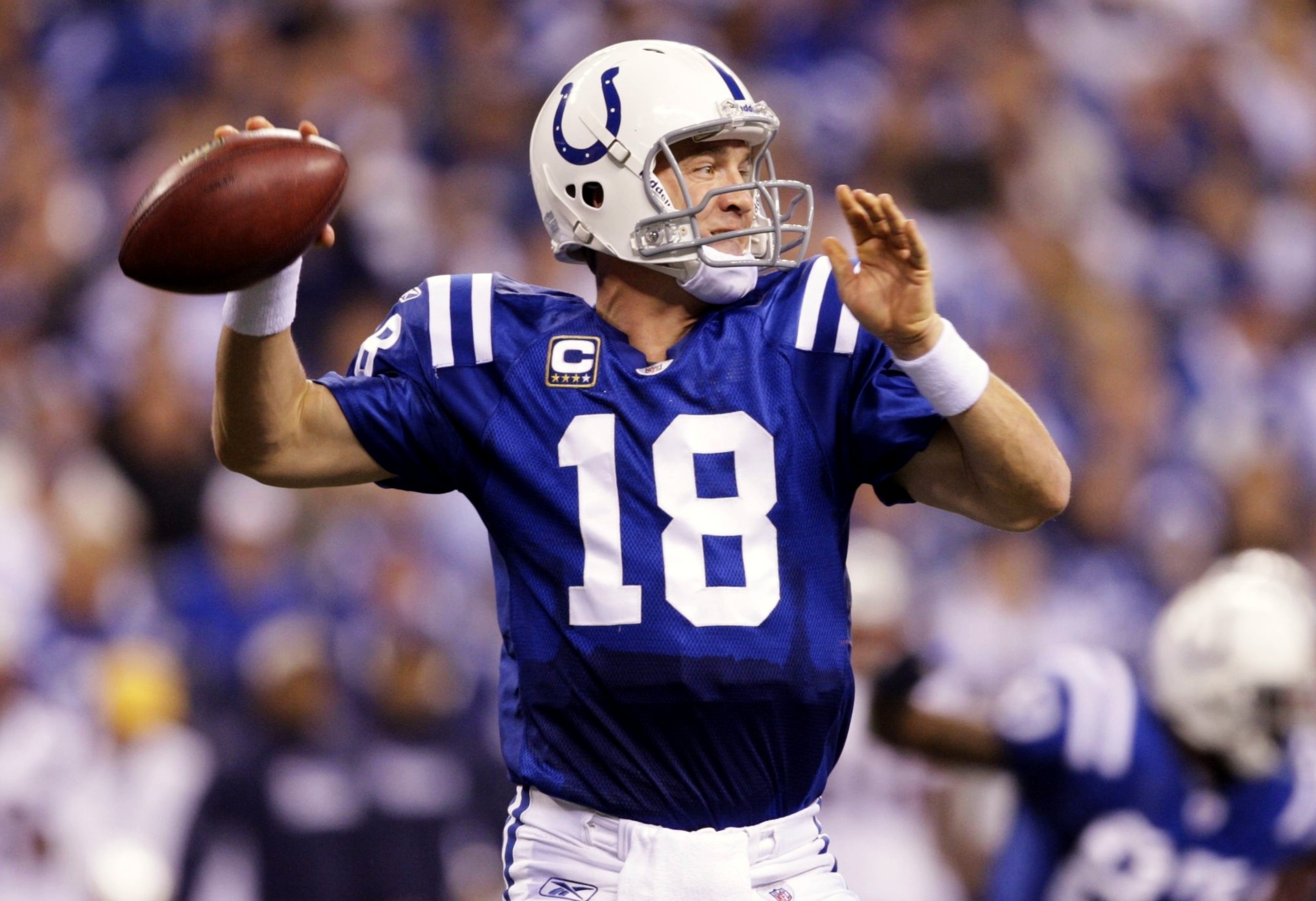 INDIANAPOLIS - NOVEMBER 15: Quarterback Peyton Manning #18 of the Indianapolis Colts throws the ball in the third quarter of the game against the New England Patriots at Lucas Oil Stadium on November 15, 2009 in Indianapolis, Indiana. (Photo by Jamie Squi