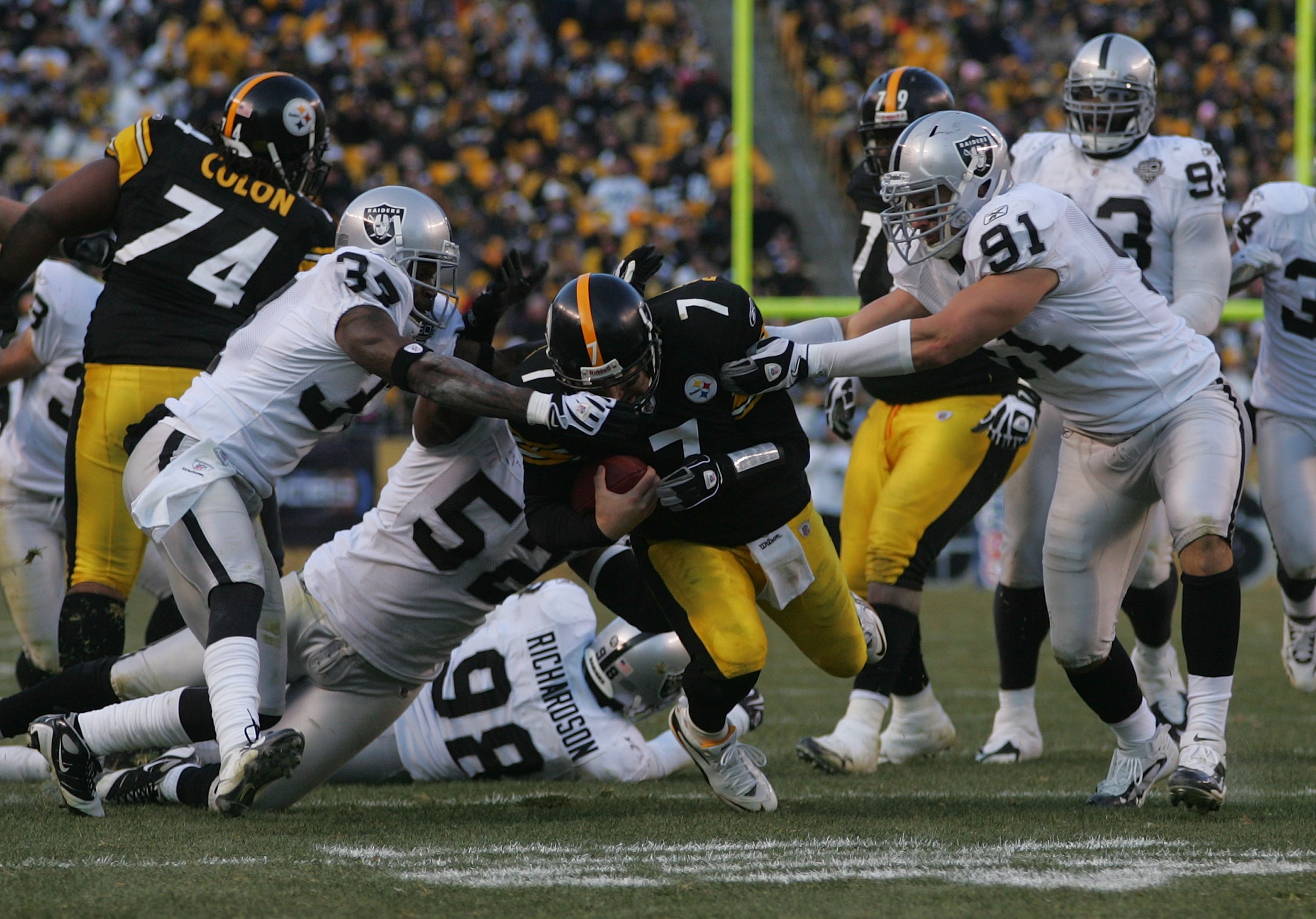 PITTSBURGH - DECEMBER 6: Ben Roethlisberger #7 of the Pittsburgh Steelers runs with the ball against the Oakland Raiders in the fourth quarter during the game on December 6, 2009 at Heinz Field in Pittsburgh, Pennsylvania. (Photo by Jared Wickerham/Getty 