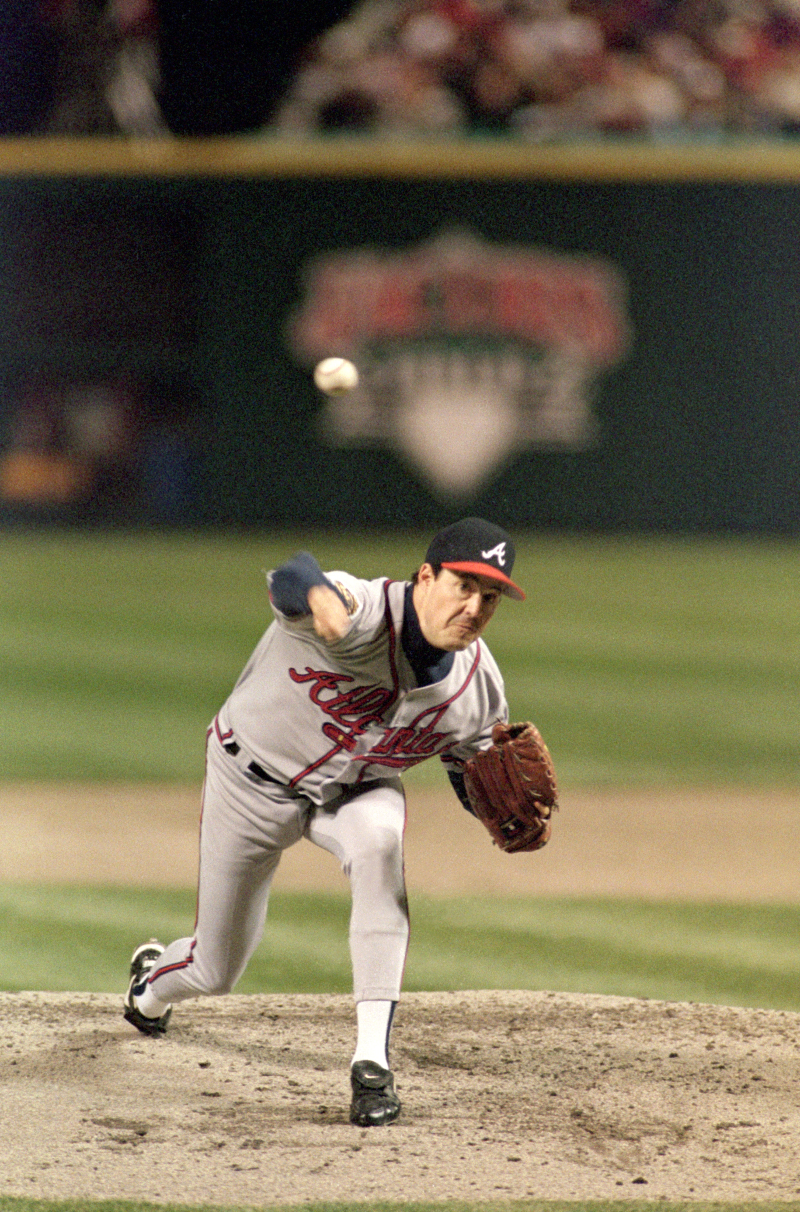 CLEVELAND - OCTOBER 26:  Greg Maddux #31 of the Atlanta Braves pitches during Game five of the 1995 World Series against the Cleveland Indians on October 26, 1995 at Jacobs Field in Cleveland, Ohio. The Indians defeated the Braves 5-4. (Photo by Jamie Squ