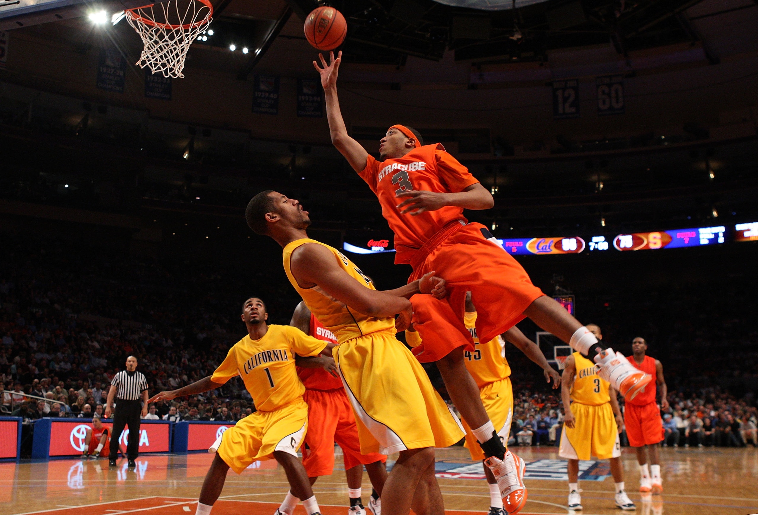 NEW YORK - NOVEMBER 19:  Mookie Jones #3 of the Syracuse Orange lays up a basket against the California Golden Bears during their semifinal game of the 2K Sports Classic on  November 19, 2009 at Madison Square Garden in New York City.  (Photo by Jim McIsa