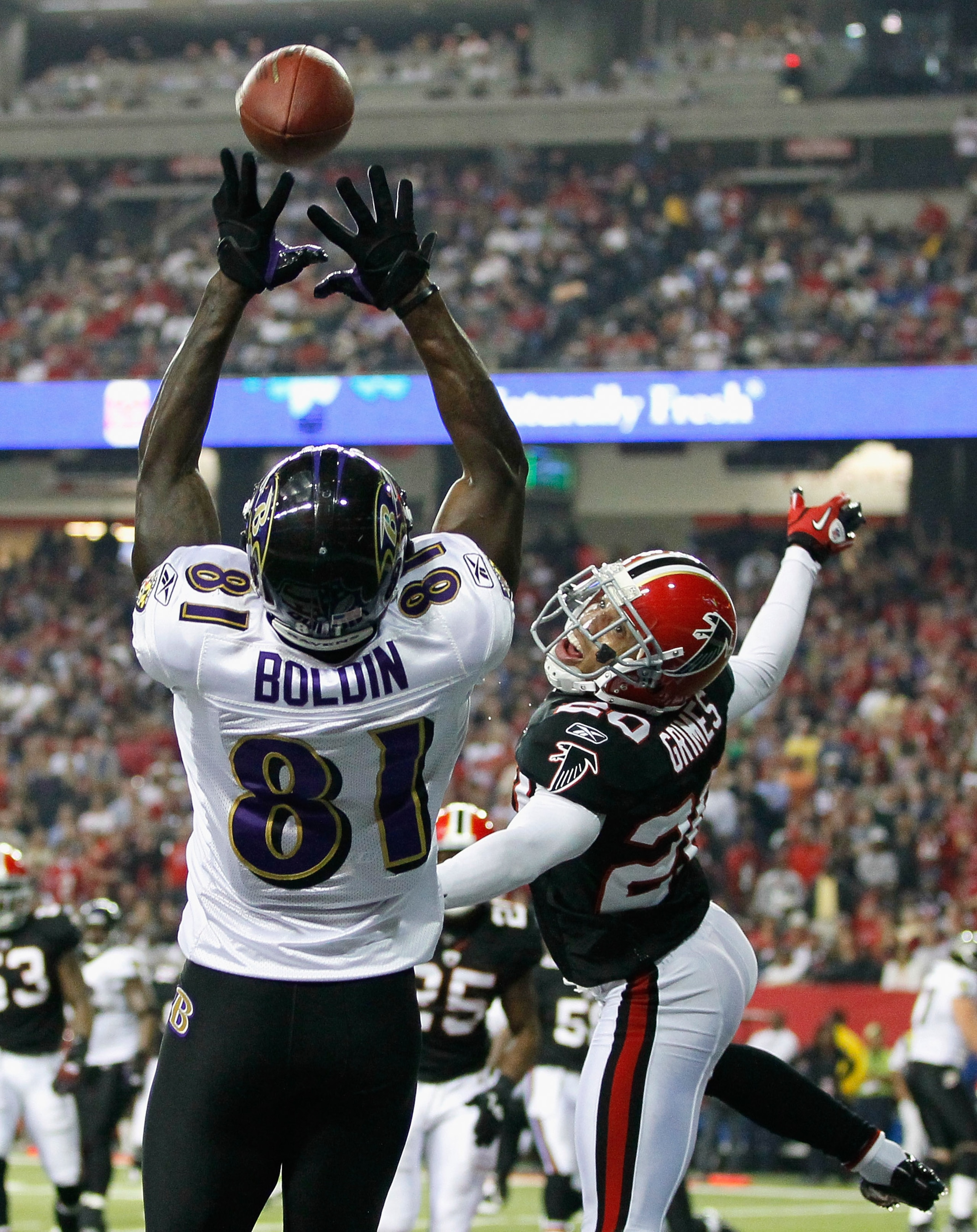 ATLANTA - NOVEMBER 11:  Anquan Boldin #81 of the Baltimore Ravens pulls in this touchdown reception against Brent Grimes #20 of the Atlanta Falcons at Georgia Dome on November 11, 2010 in Atlanta, Georgia.  (Photo by Kevin C. Cox/Getty Images)