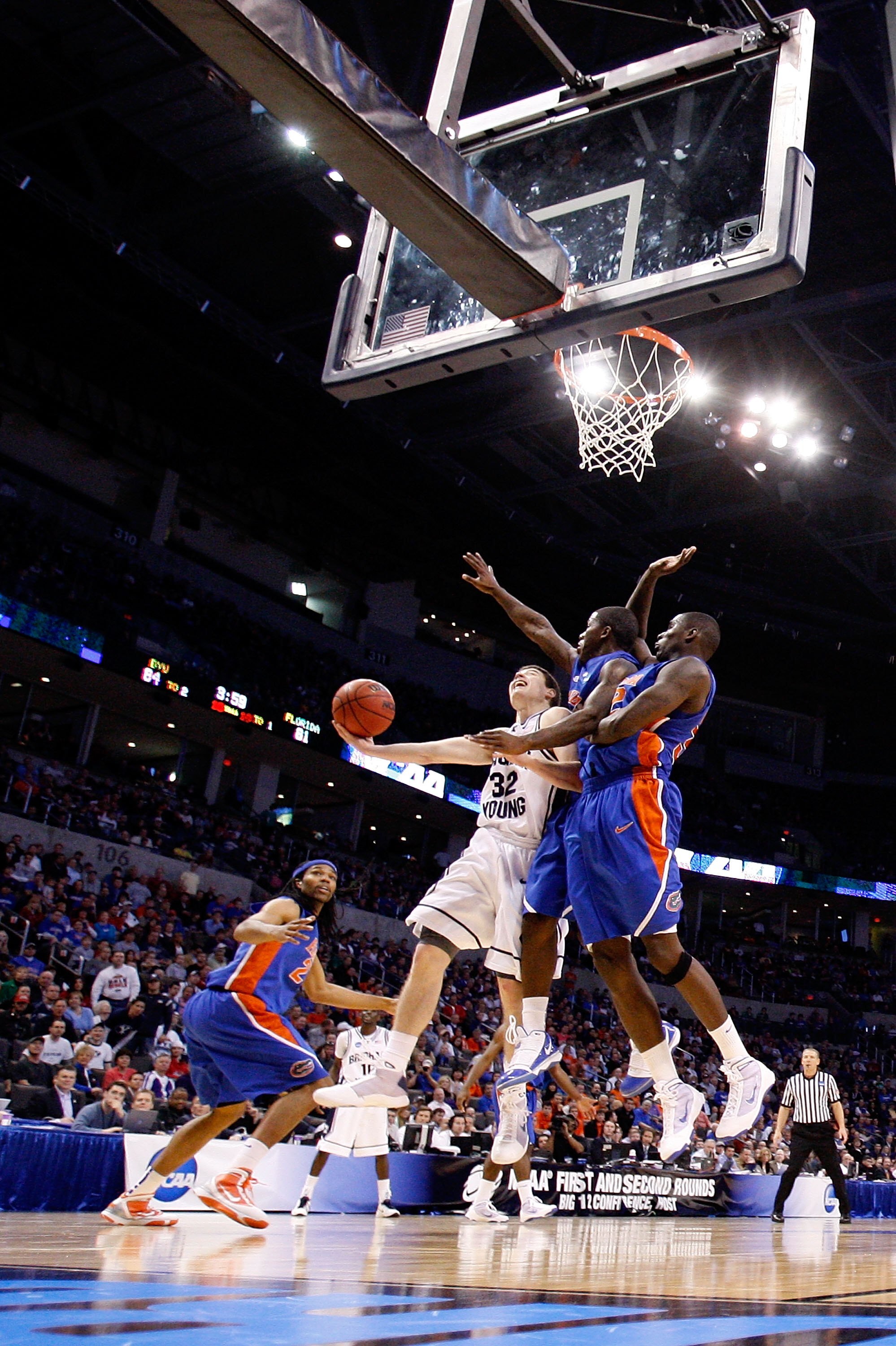 OKLAHOMA CITY - MARCH 18: Jimmer Fredette #32 of the BYU Cougars drives for a shot attempt against the Florida Gators during the first round of the 2010 NCAA men�s basketball tournament at Ford Center on March 18, 2010 in Oklahoma City, Oklahoma. (Photo OKLAHOMA CITY - MARCH 18: Jimmer Fredette #32 of the BYU Cougars drives for a shot attempt against the Florida Gators during the first round of the 2010 NCAA men�s basketball tournament at Ford Center on March 18, 2010 in Oklahoma City, Oklahoma. (Photo