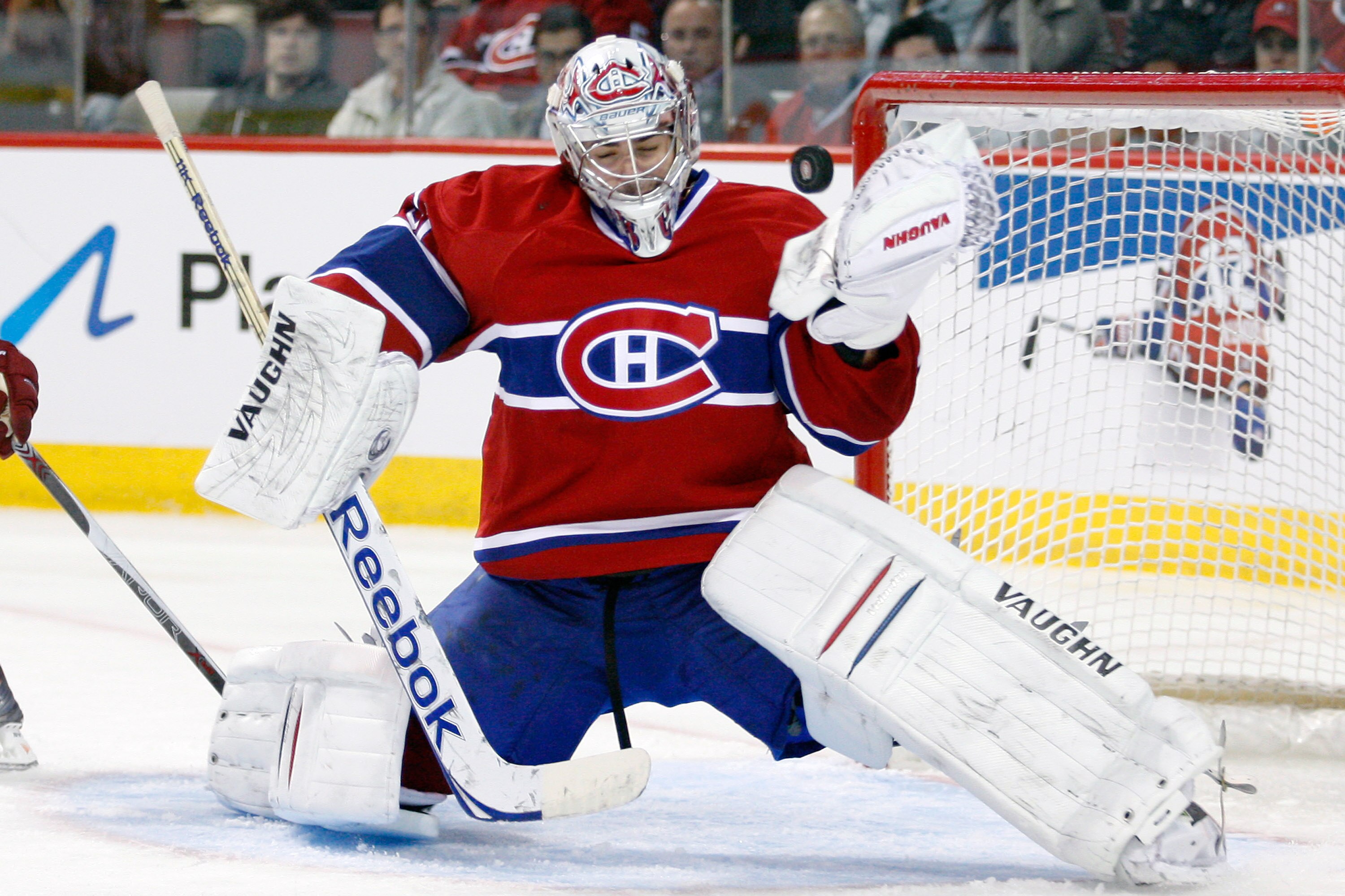 MONTREAL, QC - OCTOBER 25:  Carey Price #31 of the Montreal Canadiens makes a glove save on the puck during the NHL game against the Phoenix Coyotes at the Bell Centre on October 25, 2010 in Montreal, Quebec, Canada.  The Canadiens defeated the Coyotes 3-
