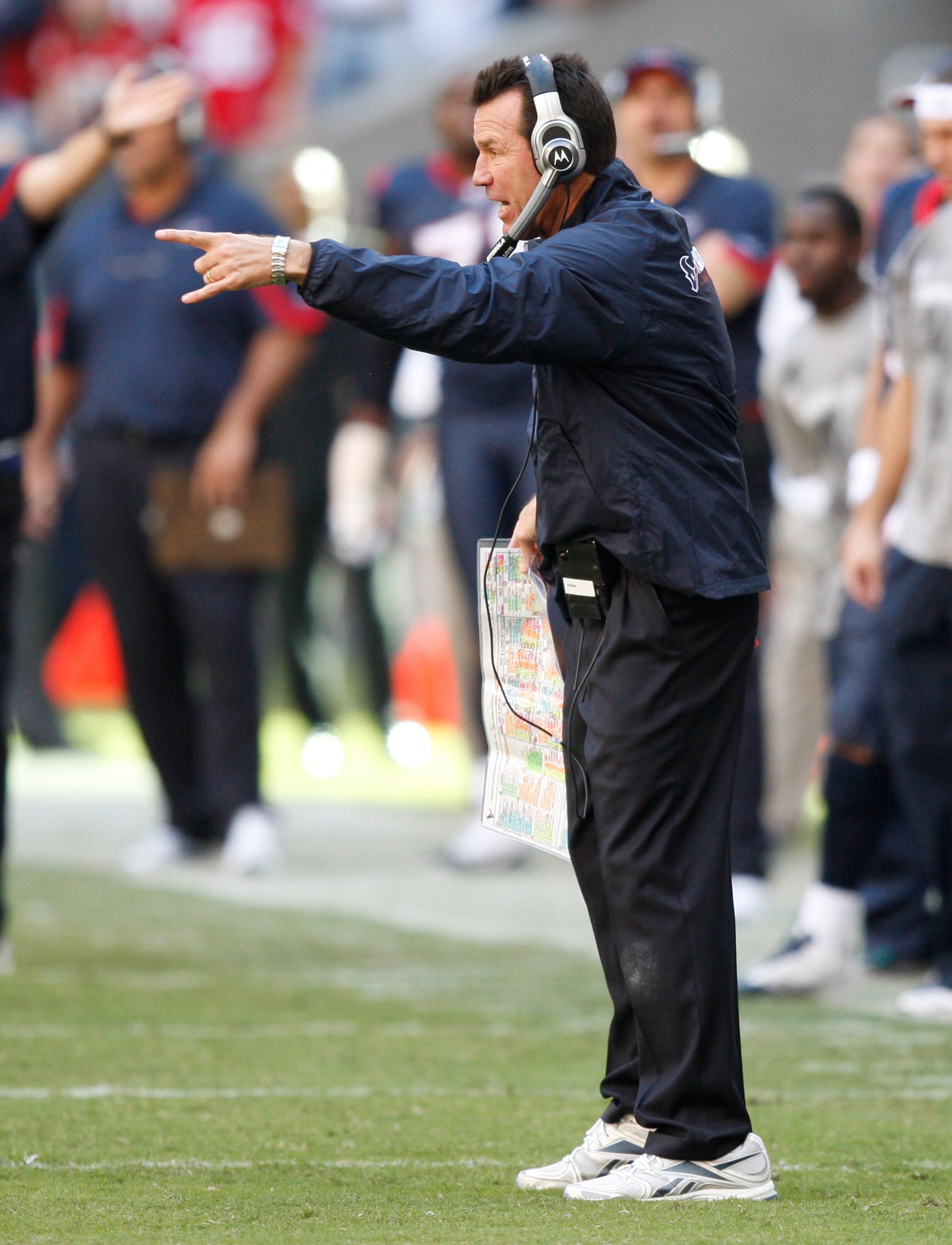 HOUSTON - NOVEMBER 07:  Gary Kubiak of the Houston Texans argues with referee Mike Carey #64 as he calls intentional grounding on him during a game against the San Diego Chargers at Reliant Stadium on November 7, 2010 in Houston, Texas.  (Photo by Bob Lev