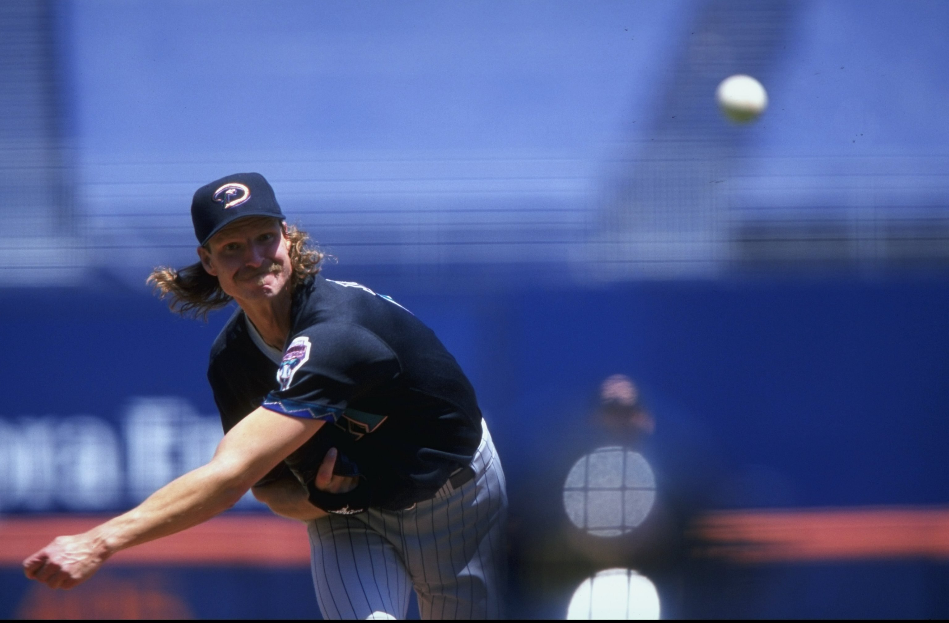 25 Apr 1999:  Pitcher Randy Johnson #51 of the Arizona Diamondbacks pitches the ball during the game against the San Diego Padres at the Qualcomm Stadium in San Diego, California. The Diamondbacks defeated the Padres 5-3. Mandatory Credit: Todd Warshaw  /