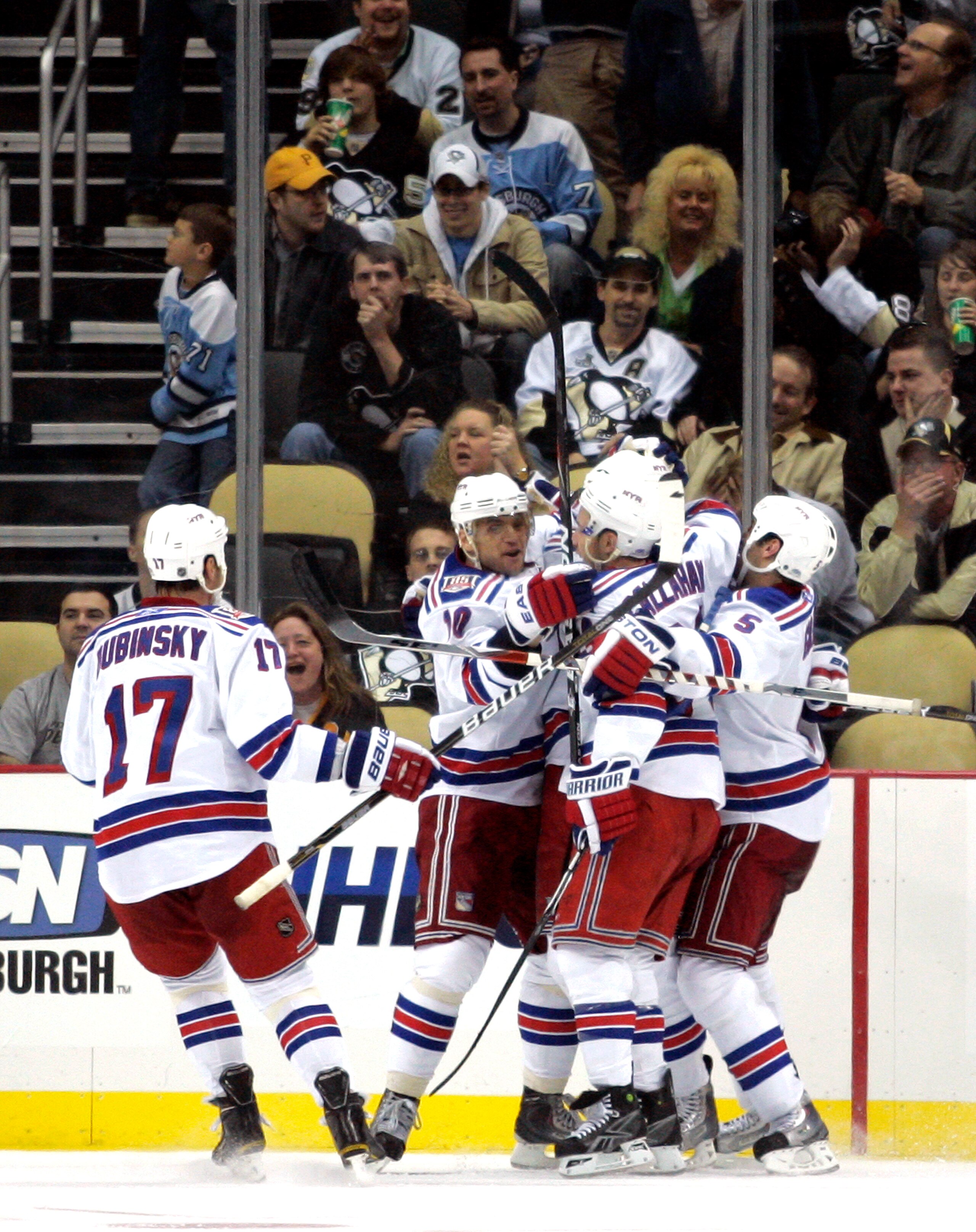 PITTSBURGH - NOVEMBER 15:  Chris Conner #18 of the New York Rangers celebrates his game-tying goal with teammates against the Pittsburgh Penguins at Consol Energy Center on November 15, 2010 in Pittsburgh, Pennsylvania.  The Rangers defeated the Penguins 