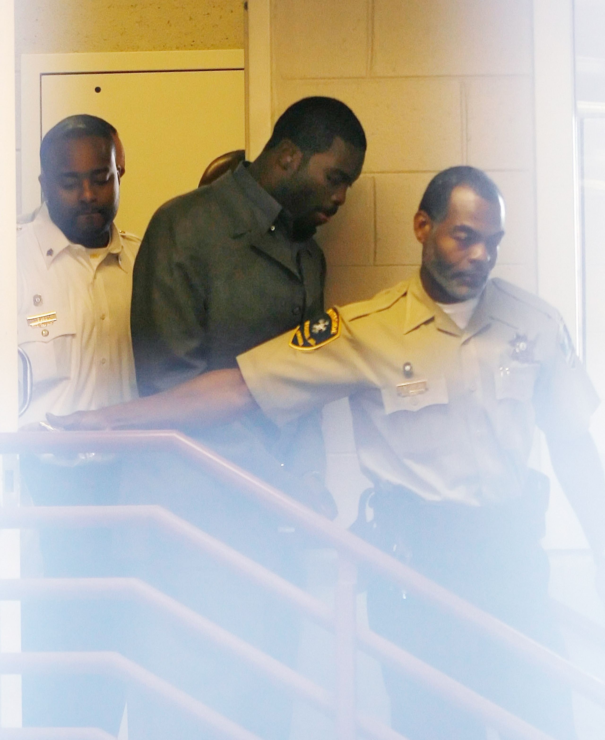 Sussex, VA - NOVEMBER 25:  Suspended Atlanta Falcons quarterback Michael Vick (C) leaves Surry County Circuit Court after entering a guilty plea on two felony counts connected to dog fighting on November 25, 2008 in Sussex, Virginia. Under a plea agreemen