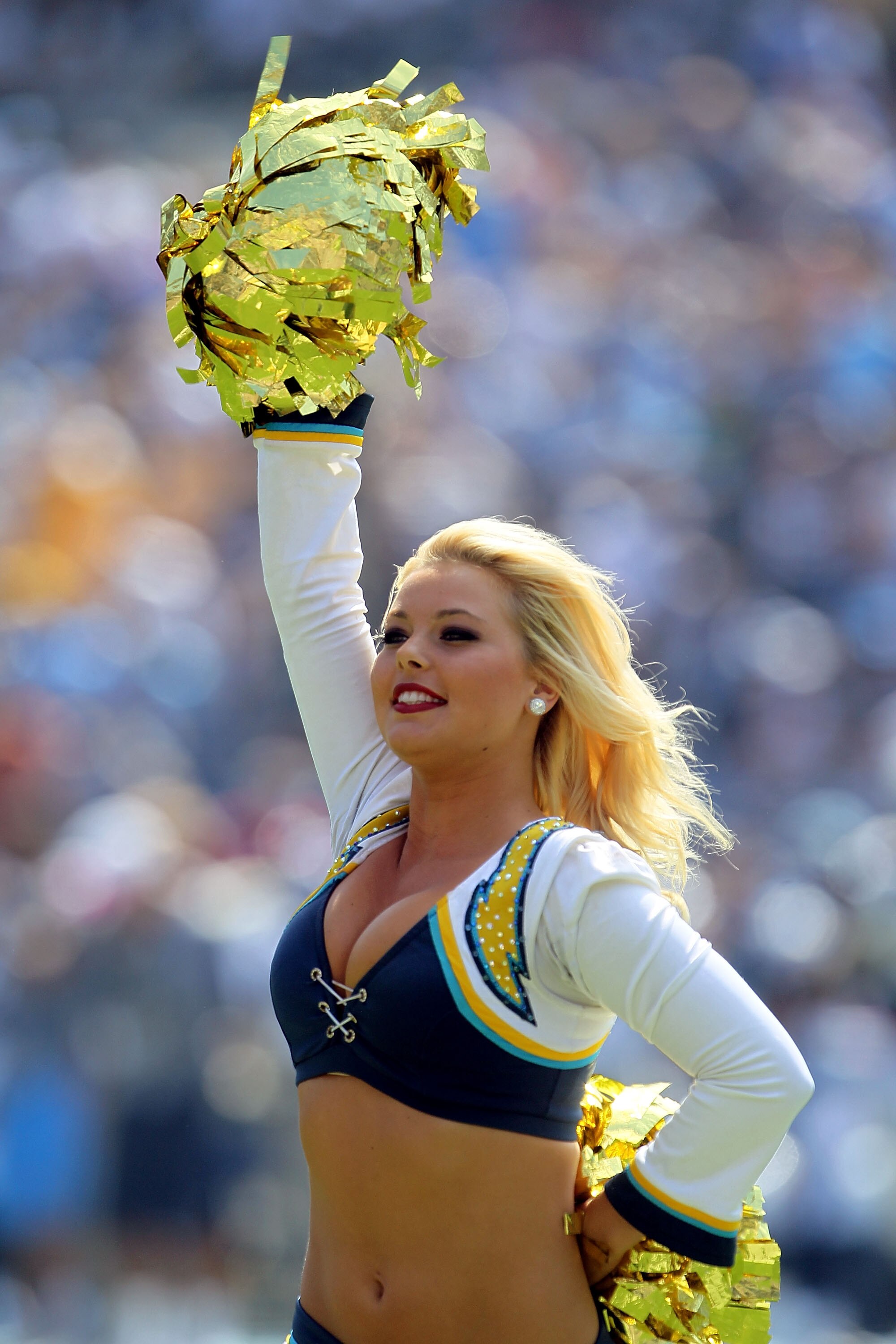 SAN DIEGO - OCTOBER 03:  A cheerleader performs prior to the start of the game between the San Diego Chargers and the Arizona Cardinals at Qualcomm Stadium on October 3, 2010 in San Diego, California. The Chargers defeated the Cardinals 41-10.  (Photo by 