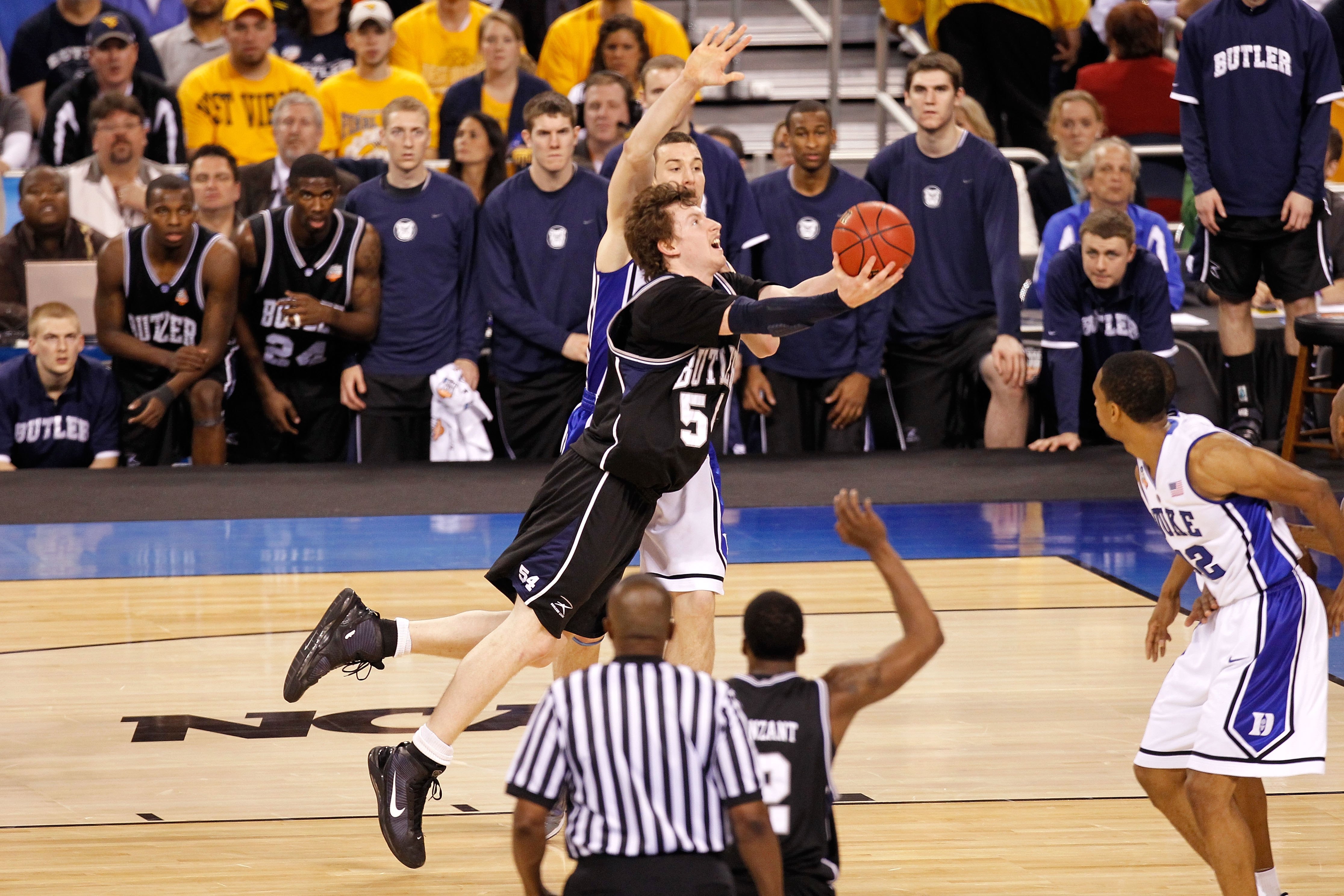 INDIANAPOLIS - APRIL 05: Matt Howard #54 of the Butler Bulldogs drives for a shot attempt against the Duke Blue Devils during the 2010 NCAA Division I Men's Basketball National Championship game at Lucas Oil Stadium on April 5, 2010 in Indianapolis, Indi INDIANAPOLIS - APRIL 05: Matt Howard #54 of the Butler Bulldogs drives for a shot attempt against the Duke Blue Devils during the 2010 NCAA Division I Men's Basketball National Championship game at Lucas Oil Stadium on April 5, 2010 in Indianapolis, Indi