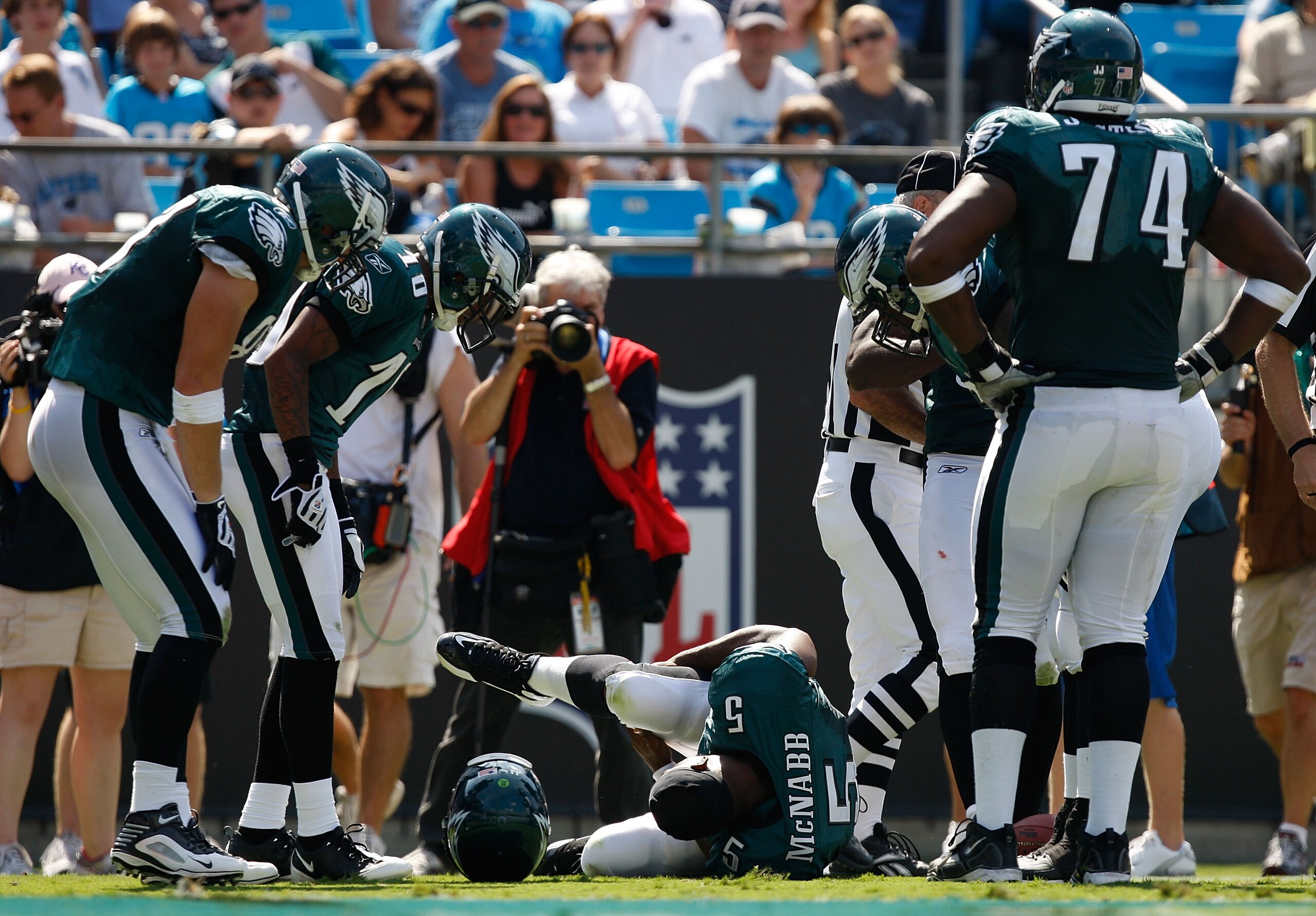 CHARLOTTE, NC - SEPTEMBER 13:  Quarterback Donovan McNabb #5 of the Philadelphia Eagles lays on the ground after injuring his knee in the second half of their NFL season opener against the Carolina Panthers at Bank of America Stadium on September 13, 2009