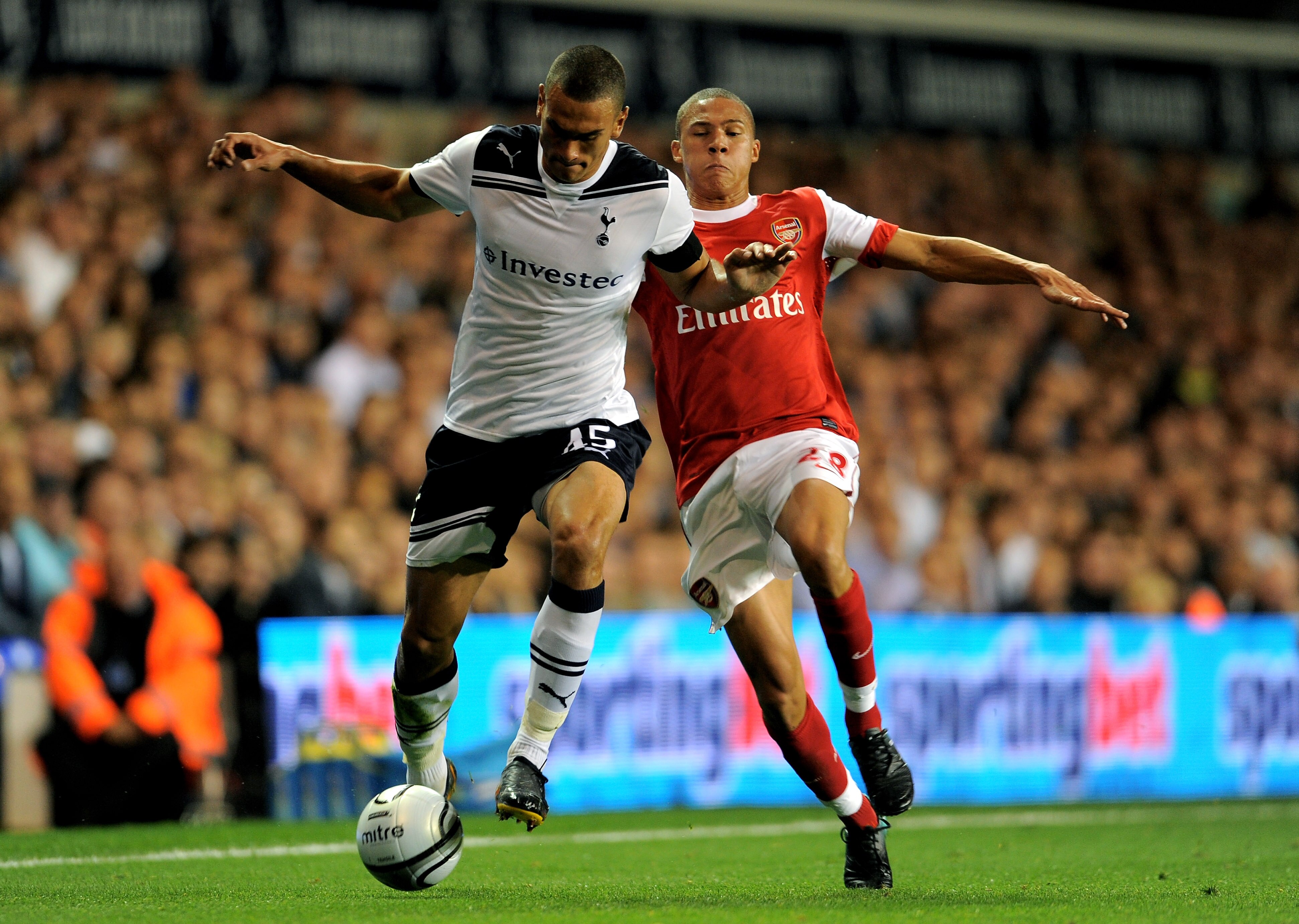 LONDON, ENGLAND - SEPTEMBER 21:  Steven Caulker of Spurs holds off the challenge from Kieran Gibbs of Arsenal during the Carling Cup third round match between Tottenham Hotspur and Arsenal at White Hart Lane on September 21, 2010 in London, England.  (Pho