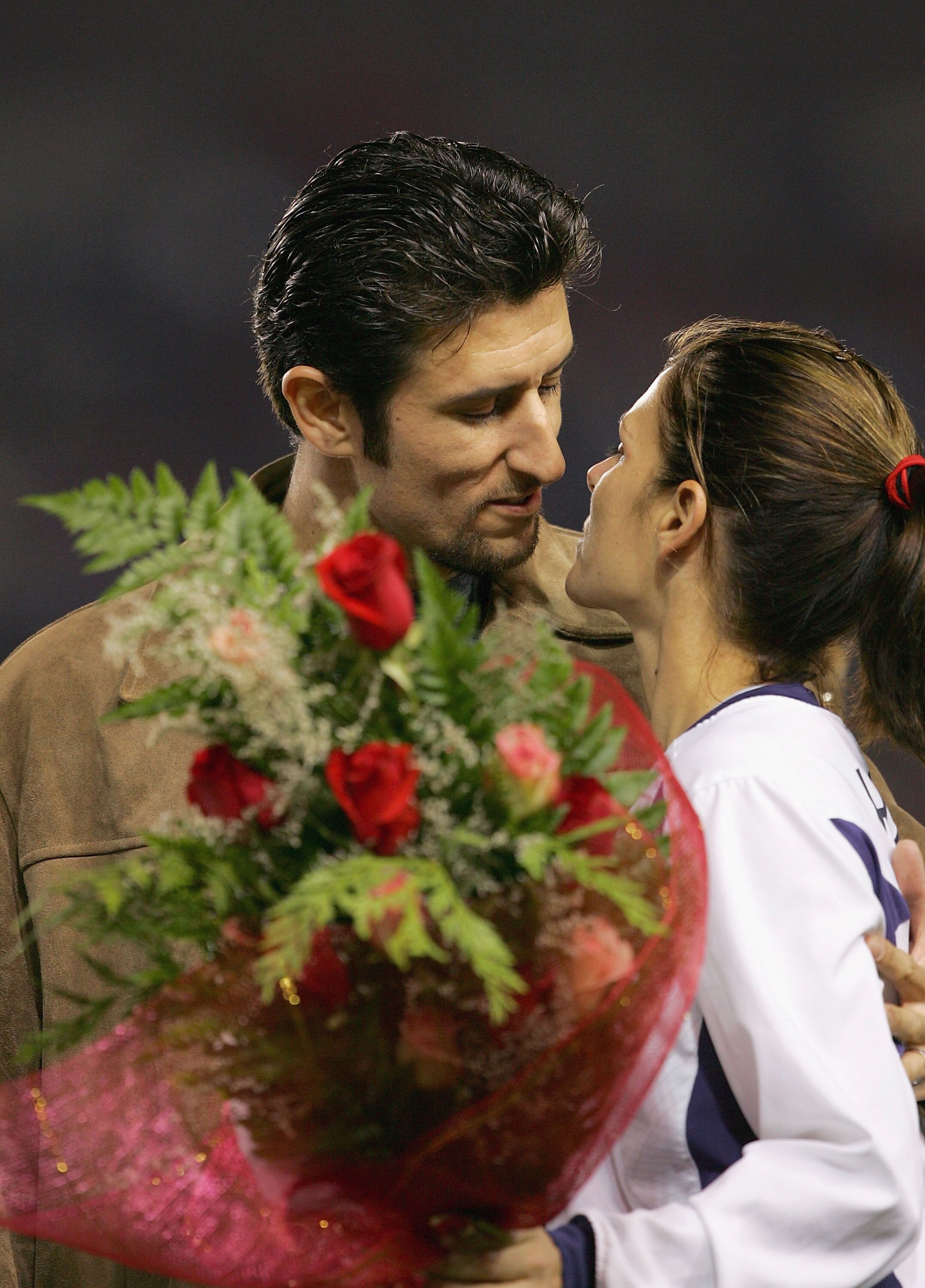 CARSON, CA - DECEMBER 8:   Mia Hamm #9 of USA is honored in a retirement ceremony before taking on Mexico during the 'Fan Celebration Tour' finale on December 8, 2004 at The Home Depot Center in Carson, California.  (Photo by Lisa Blumenfeld/Getty Images)