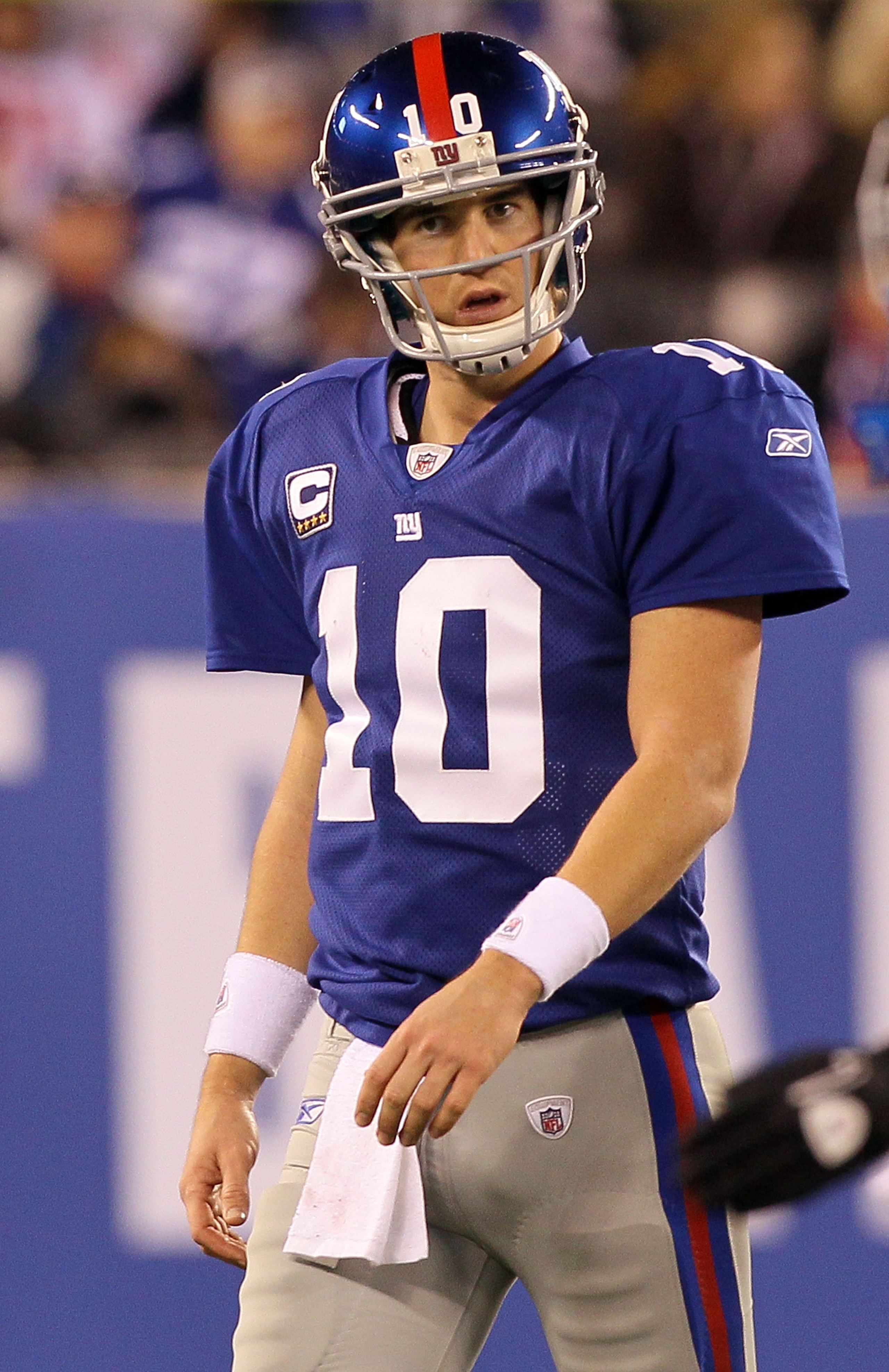 EAST RUTHERFORD, NJ - NOVEMBER 14:  Eli Manning #10 of the New York Giants walks off the field after losing the ball on a fumble in the fourth quarter against of the Dallas Cowboys on November 14, 2010 at the New Meadowlands Stadium in East Rutherford, Ne
