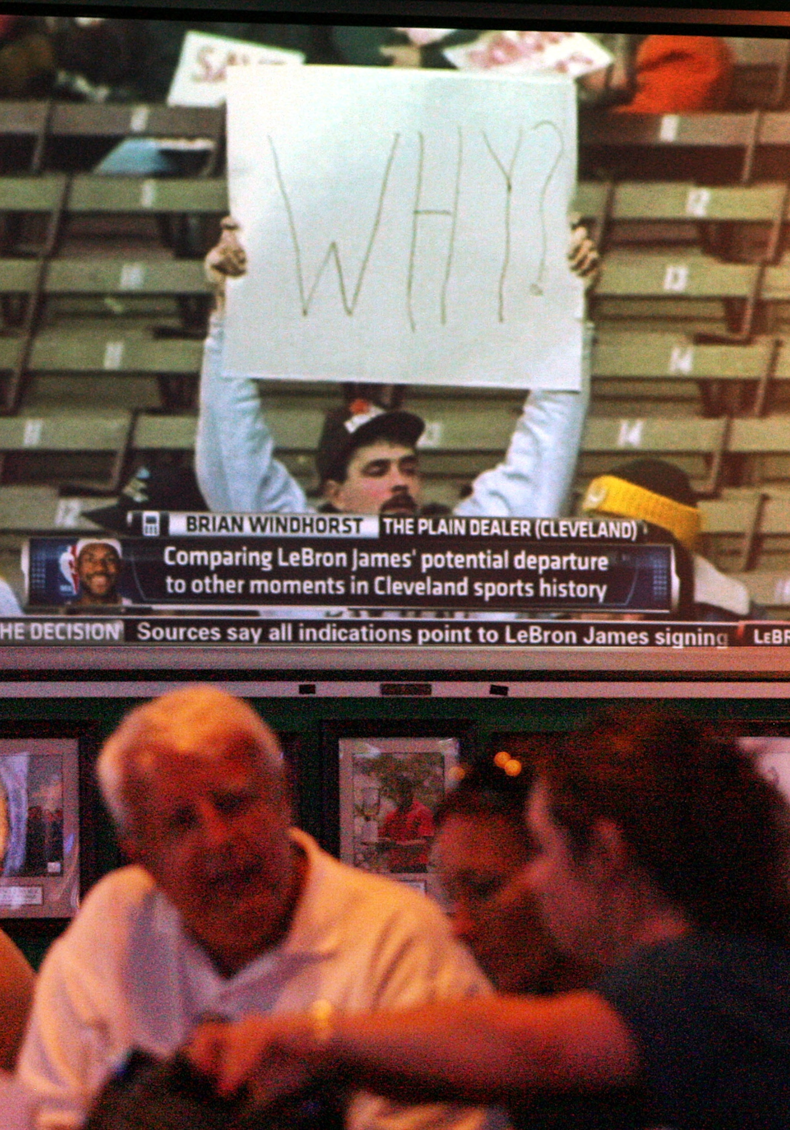 BOCA RATON, FL - JULY 08: Forward LeBron James announces he will join the Miami Heat during a televised interview as fans look on at Duffy's on July 8, 2010 in Boca Raton, Florida.  (Photo by Marc Serota/Getty Images)