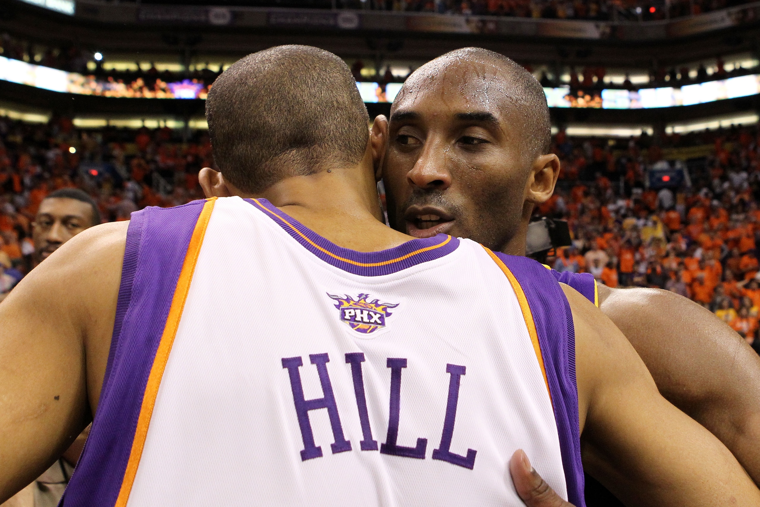 PHOENIX - MAY 29:  Grant Hill #33 of the Phoenix Suns is hugged by Kobe Bryant #24 of the Los Angeles Lakers after the Lakers defeated the Suns 111-103 in Game Six of the Western Conference Finals during the 2010 NBA Playoffs at US Airways Center on May 2