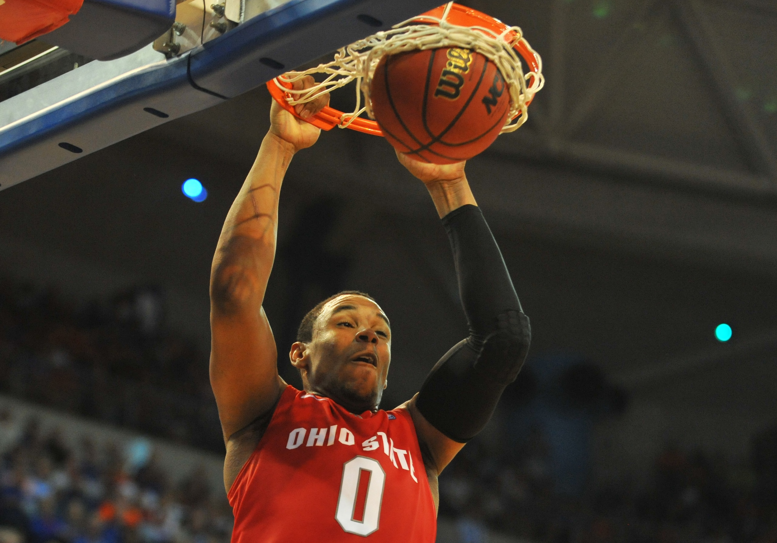 GAINESVILLE, FL - NOVEMBER 16: Forward Jared Sullinger #0 of the Ohio State Buckeyes scores against the Florida Gators November 16, 2010 at the Stephen C. O'Connell Center in Gainesville, Florida.  (Photo by Al Messerschmidt/Getty Images)