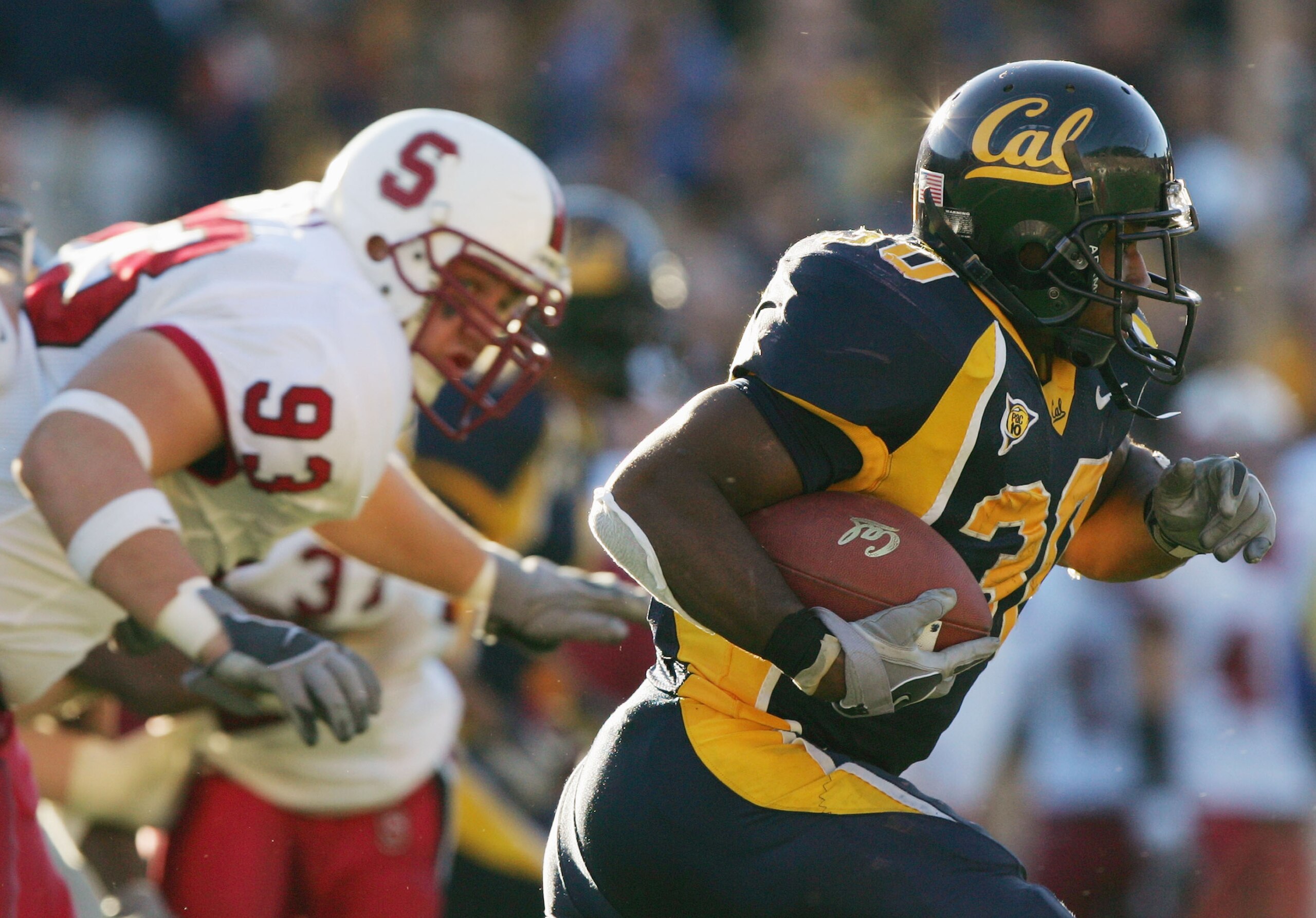 BERKELEY, CA - NOVEMBER 20: Tailback J.J. Arrington #30 of the University of California, Berkeley Golden Bears carries the ball against the Stanford University Cardinal during the game at Memorial Stadium on November 20, 2004 in Berkeley, California. Th BERKELEY, CA - NOVEMBER 20: Tailback J.J. Arrington #30 of the University of California, Berkeley Golden Bears carries the ball against the Stanford University Cardinal during the game at Memorial Stadium on November 20, 2004 in Berkeley, California. Th