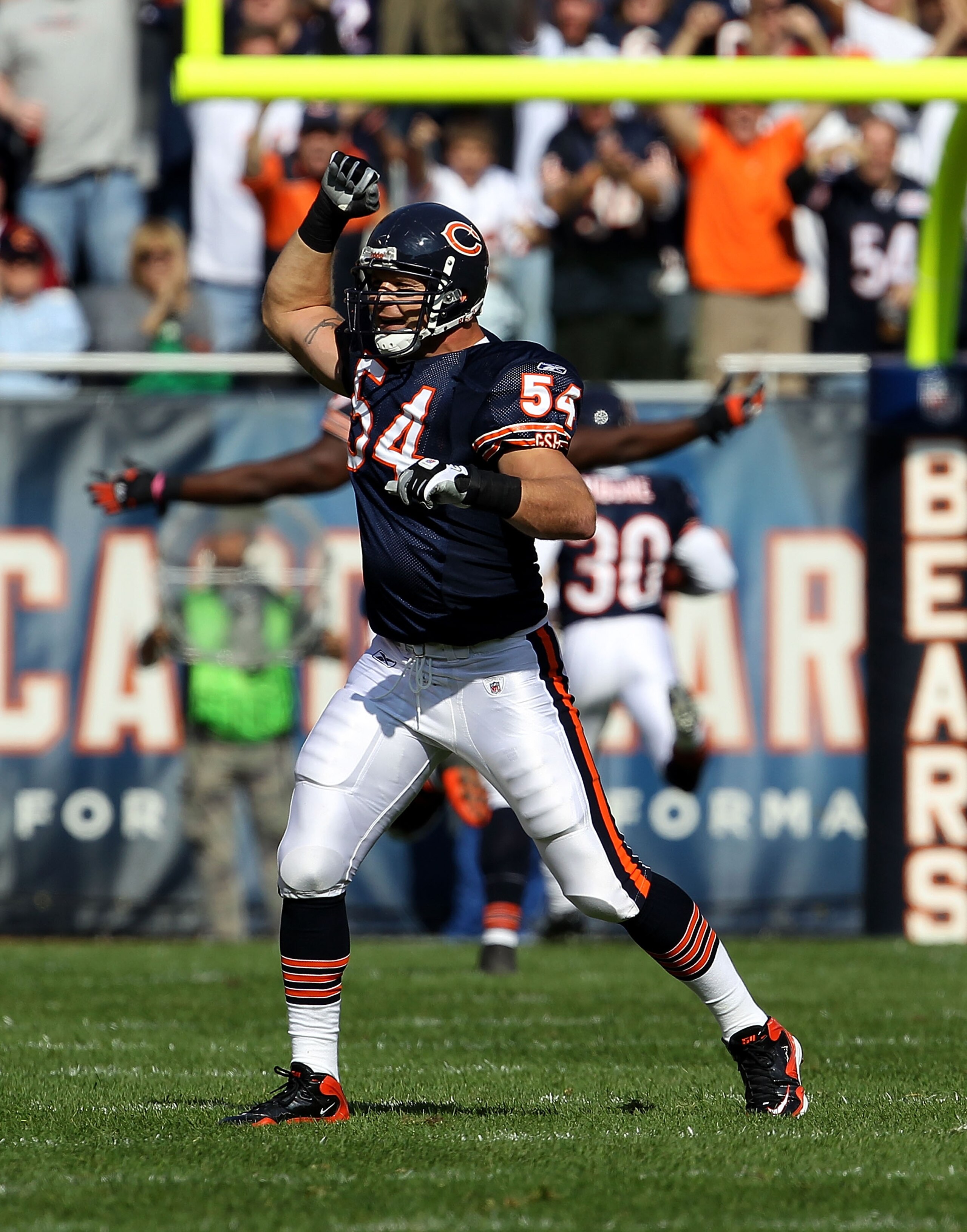 CHICAGO - OCTOBER 24: Brian Urlacher #54 of the Chicago Bears celebrates a defensive touchdown against the Washington Redskins at Soldier Field on October 24, 2010 in Chicago, Illinois. The Redskins defeated the Bears 17-14. (Photo by Jonathan Daniel/Gett