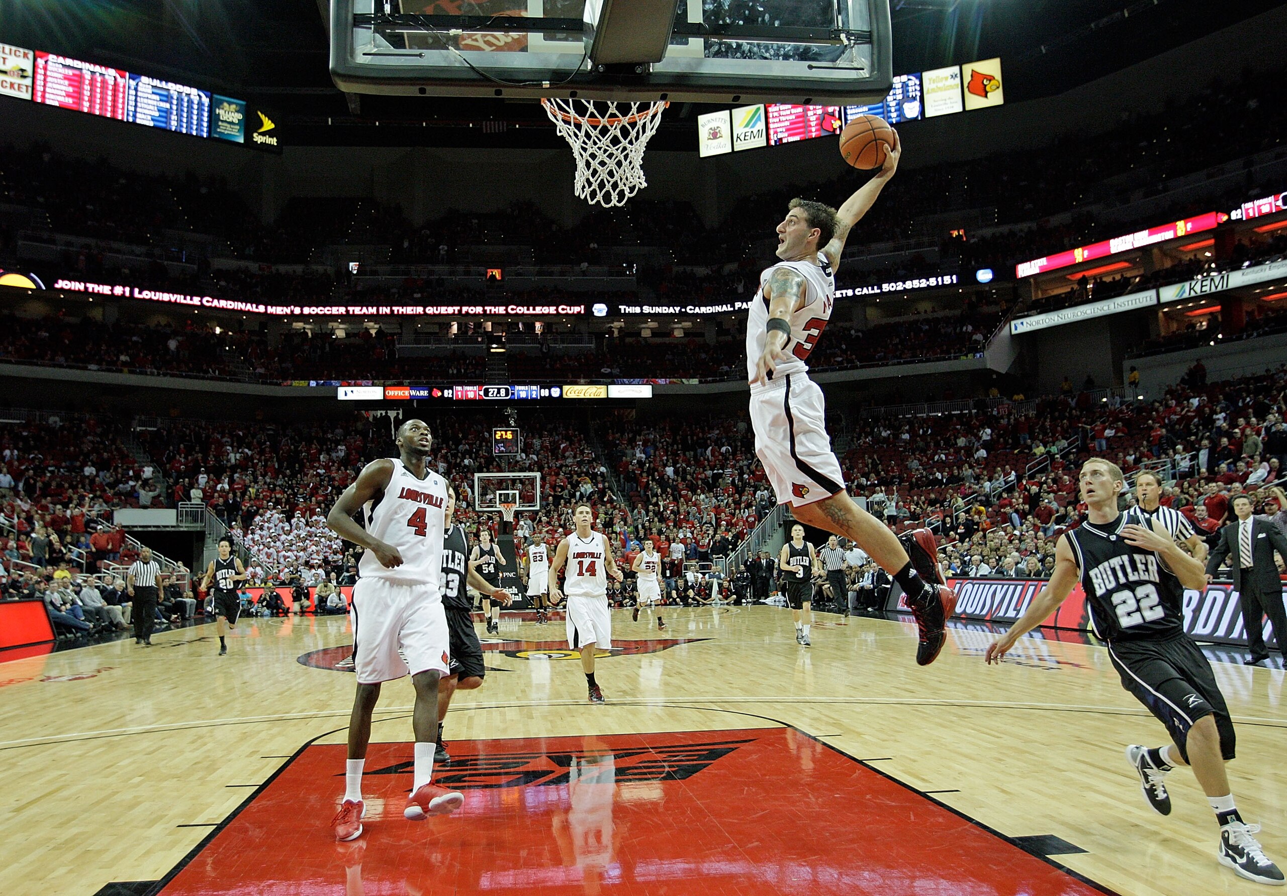 LOUISVILLE, KY - NOVEMBER 16: Mike Marra #33 of the Louisville Cardinals dunks the ball during the game against the Butler Bulldogs at the KFC Yum! Center on November 16, 2010 in Louisville, Kentucky. Louisville won 88-73.  (Photo by Andy Lyons/Getty Imag