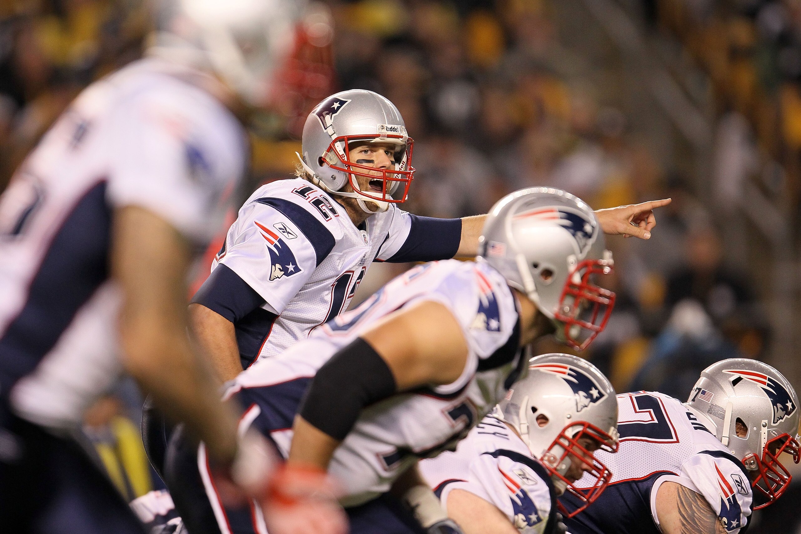 PITTSBURGH - NOVEMBER 14: Tom Brady #12 of the New England Patriots gives instructions against the Pittsburgh Steelers on November 14, 2010 at Heinz Field in Pittsburgh, Pennsylvania. (Photo by Chris McGrath/Getty Images) PITTSBURGH - NOVEMBER 14: Tom Brady #12 of the New England Patriots gives instructions against the Pittsburgh Steelers on November 14, 2010 at Heinz Field in Pittsburgh, Pennsylvania. (Photo by Chris McGrath/Getty Images)