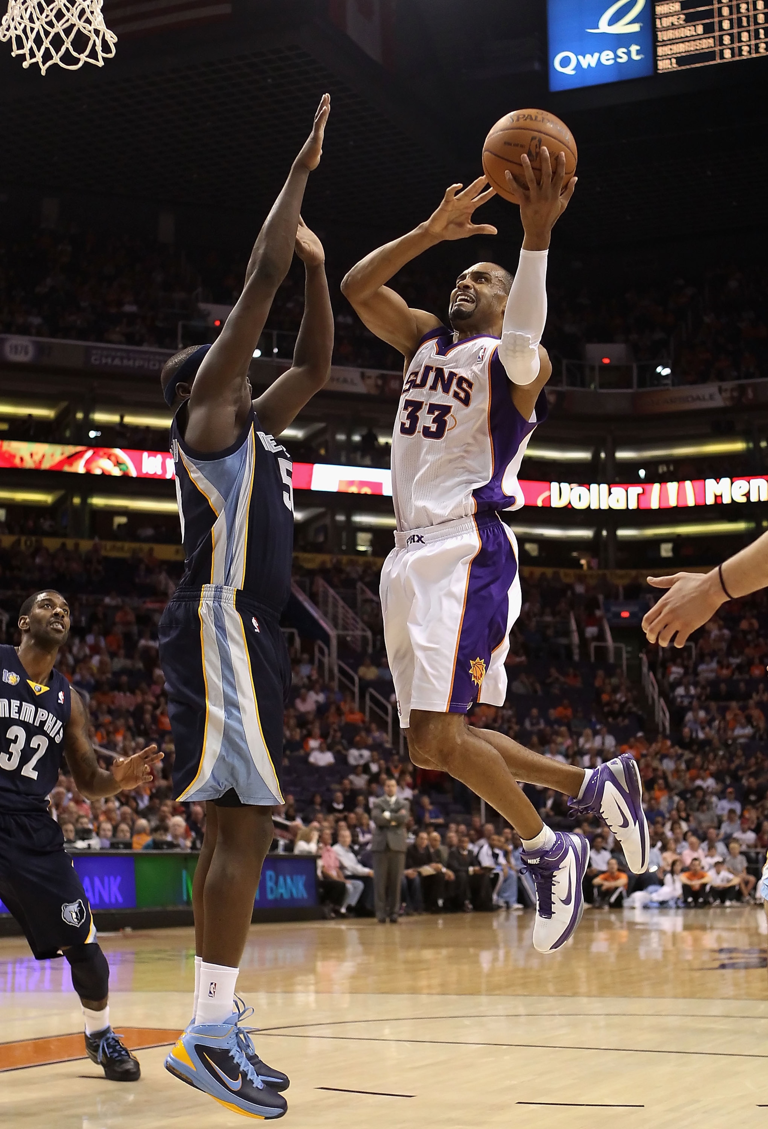 PHOENIX - NOVEMBER 05:  Grant Hill #33 of the Phoenix Suns puts up a shot against the Memphis Grizzlies during the NBA game at US Airways Center on November 5, 2010 in Phoenix, Arizona. NOTE TO USER: User expressly acknowledges and agrees that, by downloa