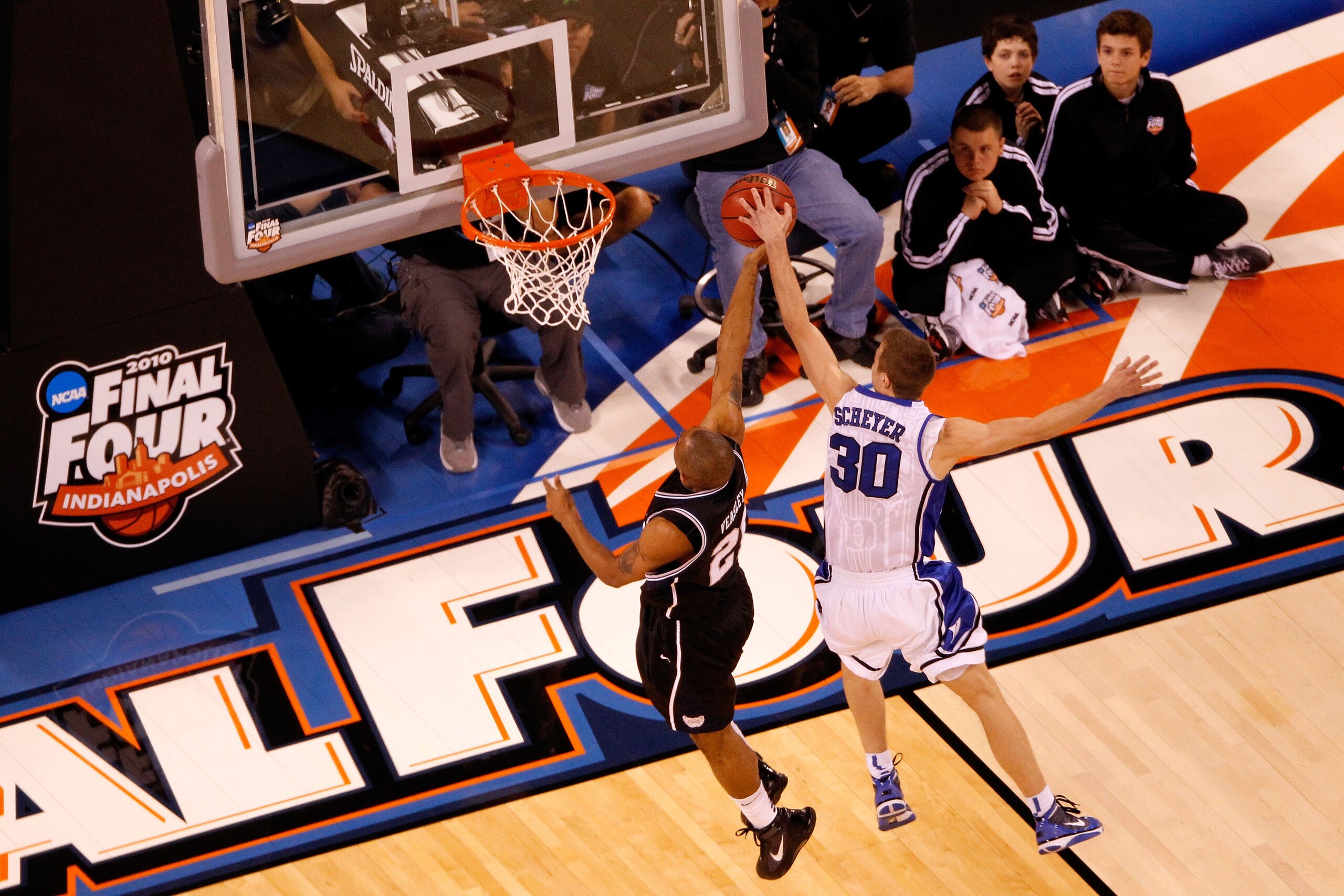 INDIANAPOLIS - APRIL 05:  Willie Veasley #21 of the Butler Bulldogs has his shot attempt  blocked by Jon Scheyer #30 of the Duke Blue Devils during the 2010 NCAA Division I Men's Basketball National Championship game at Lucas Oil Stadium on April 5, 2010