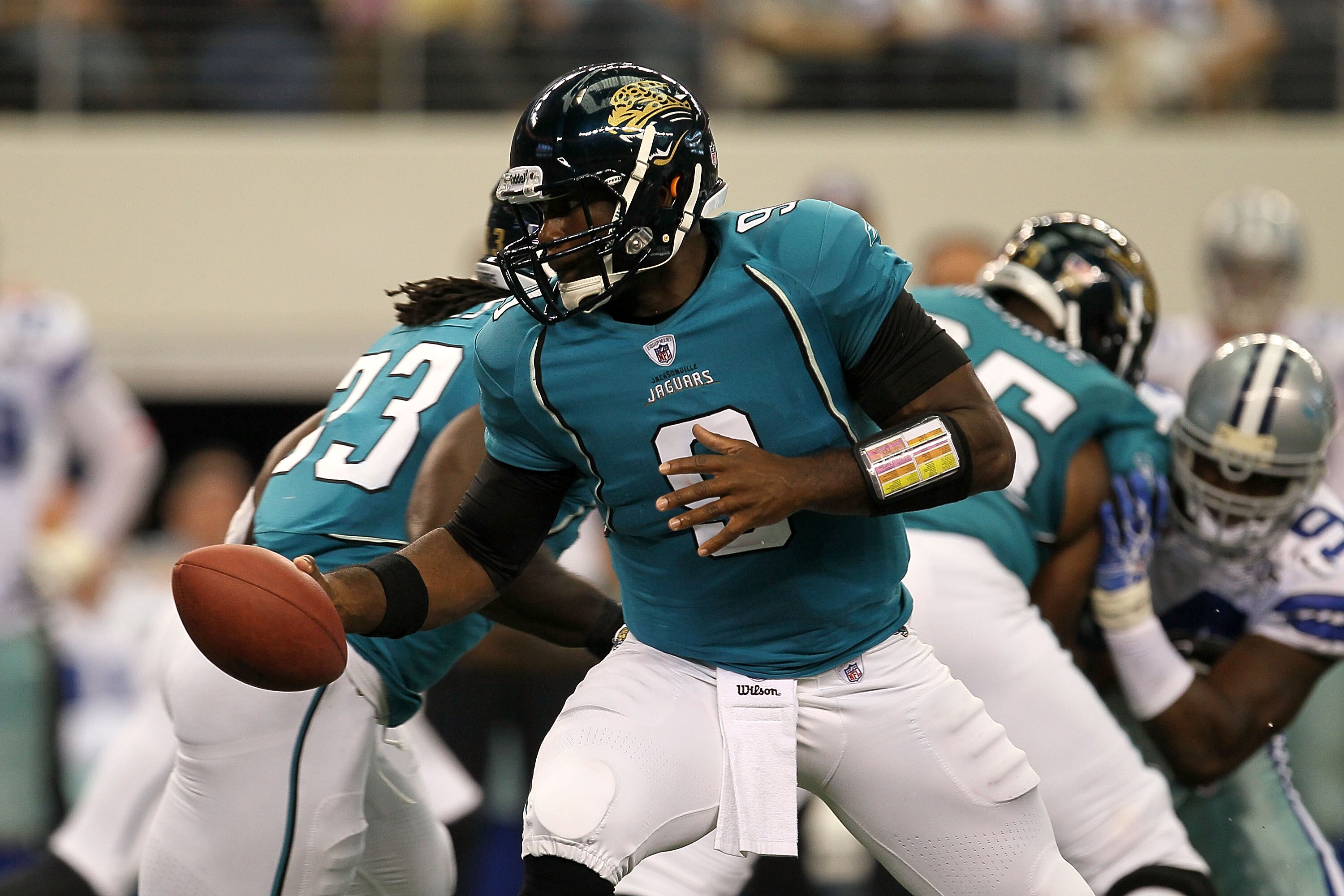 ARLINGTON, TX - OCTOBER 31:  Quaterback David Garrard #9 of the Jacksonville Jaguars turns to hand the ball off against the Dallas Cowboys at Cowboys Stadium on October 31, 2010 in Arlington, Texas.  (Photo by Stephen Dunn/Getty Images)