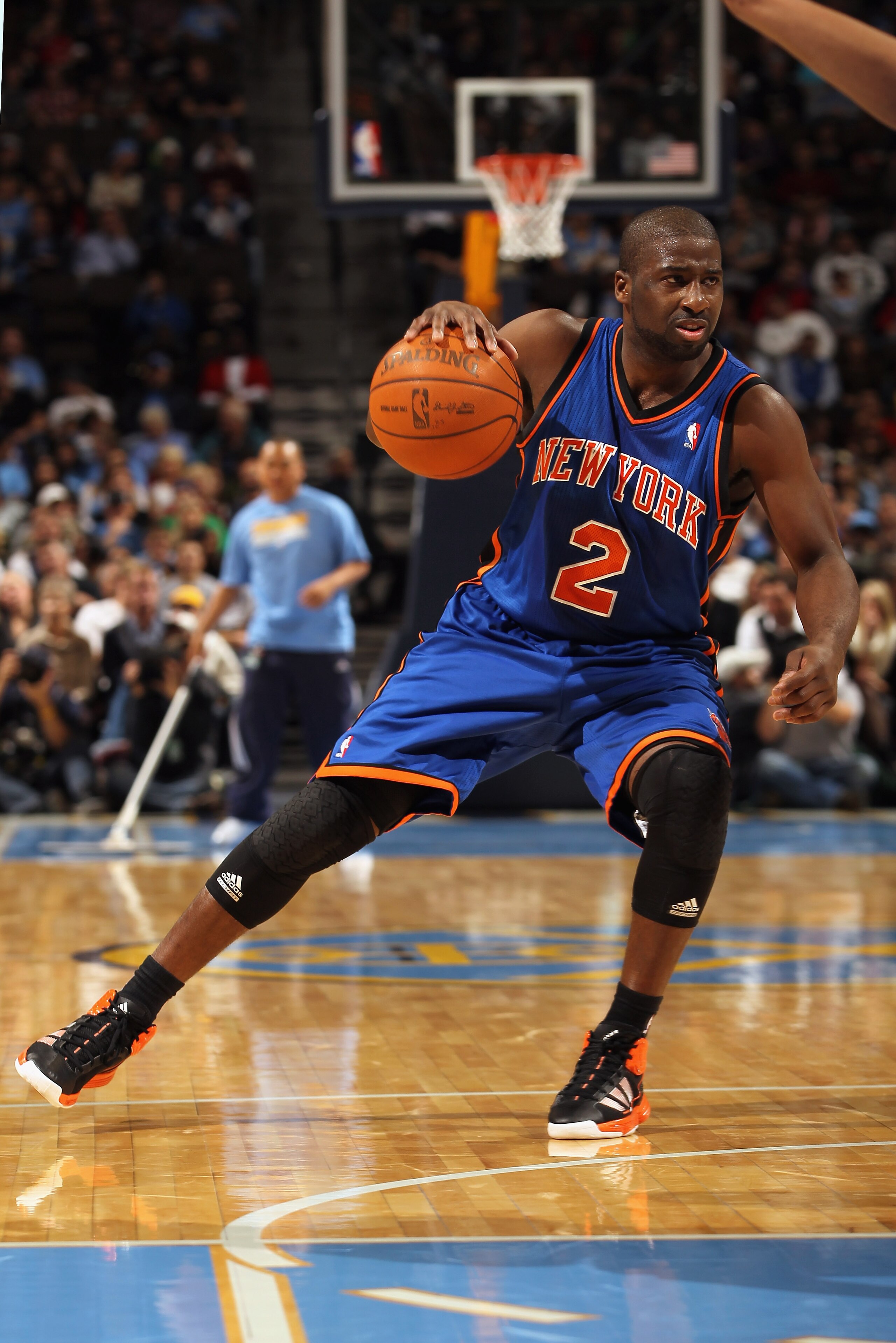 DENVER - NOVEMBER 16: Raymond Felton #2 of the New York Knicks dribbles the ball against the Denver Nuggets at the Pepsi Center on November 16, 2010 in Denver, Colorado. The Nuggets defeated the Knicks 120-118. NOTE TO USER: User expressly acknowledges a DENVER - NOVEMBER 16: Raymond Felton #2 of the New York Knicks dribbles the ball against the Denver Nuggets at the Pepsi Center on November 16, 2010 in Denver, Colorado. The Nuggets defeated the Knicks 120-118. NOTE TO USER: User expressly acknowledges a