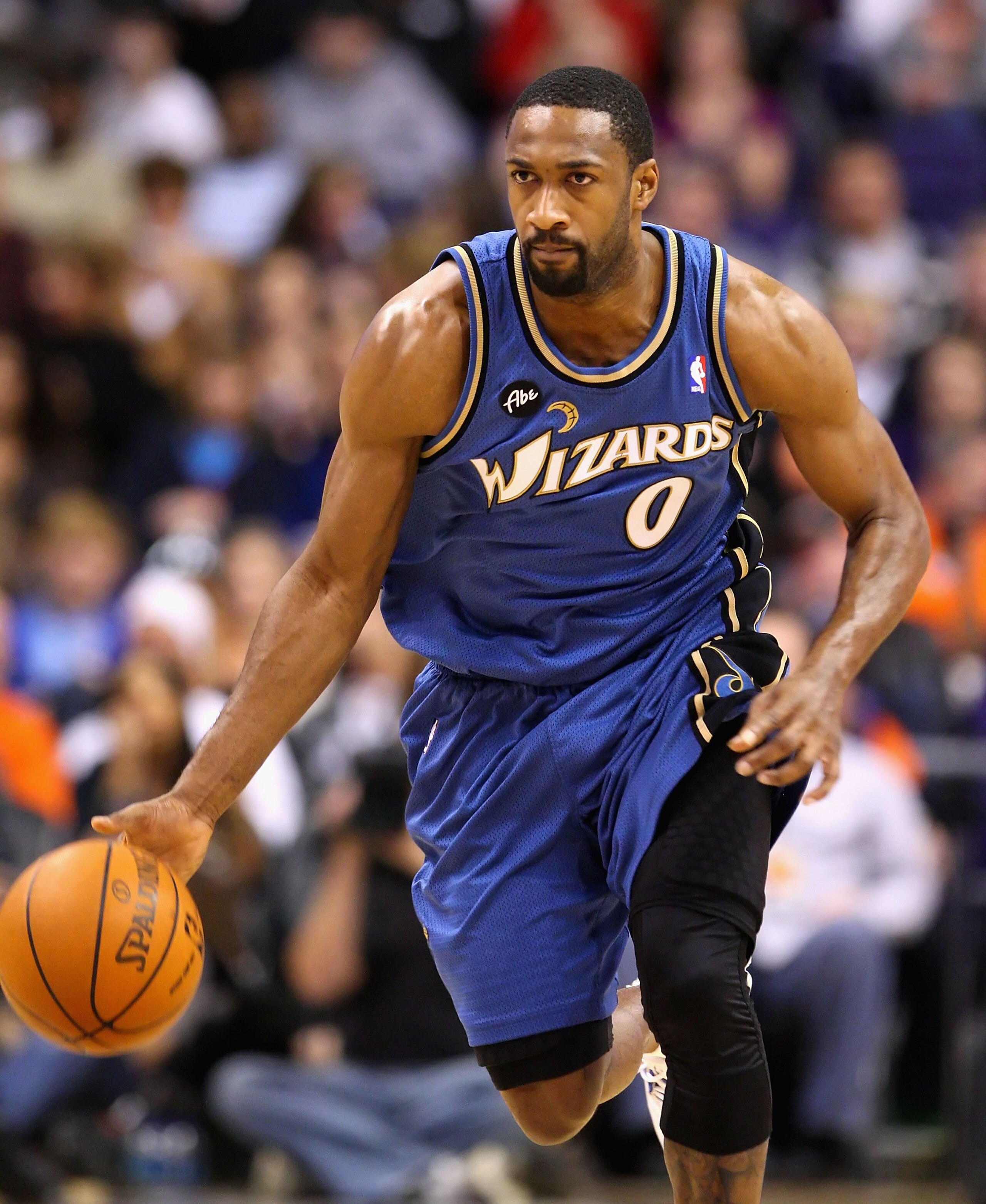 PHOENIX - DECEMBER 19: Gilbert Arenas #0 of the Washington Wizards hanldles the ball during the NBA game against the Phoenix Suns at US Airways Center on December 19, 2009 in Phoenix, Arizona. The Suns defeated the Wizards 121-95. NOTE TO USER: User expr PHOENIX - DECEMBER 19: Gilbert Arenas #0 of the Washington Wizards hanldles the ball during the NBA game against the Phoenix Suns at US Airways Center on December 19, 2009 in Phoenix, Arizona. The Suns defeated the Wizards 121-95. NOTE TO USER: User expr