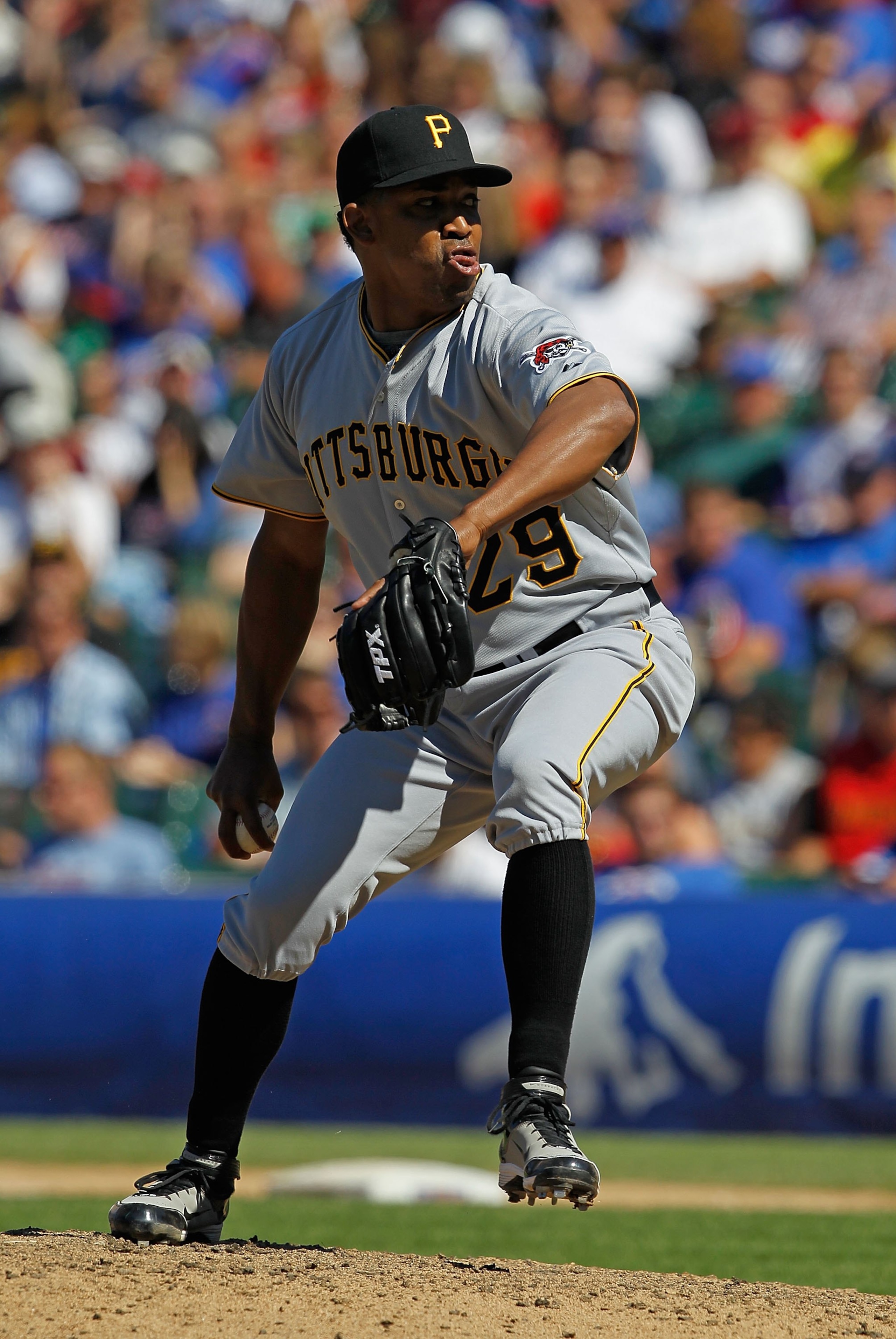 CHICAGO - JUNE 30: Octavio Dotel #29 of the Pittsburgh Pirates pitches in the 9th inning on his way to a save against the Chicago Cubs at Wrigley Field on June 30, 2010 in Chicago, Illinois. The Pirates defeated the Cubs 2-0. (Photo by Jonathan Daniel/Get