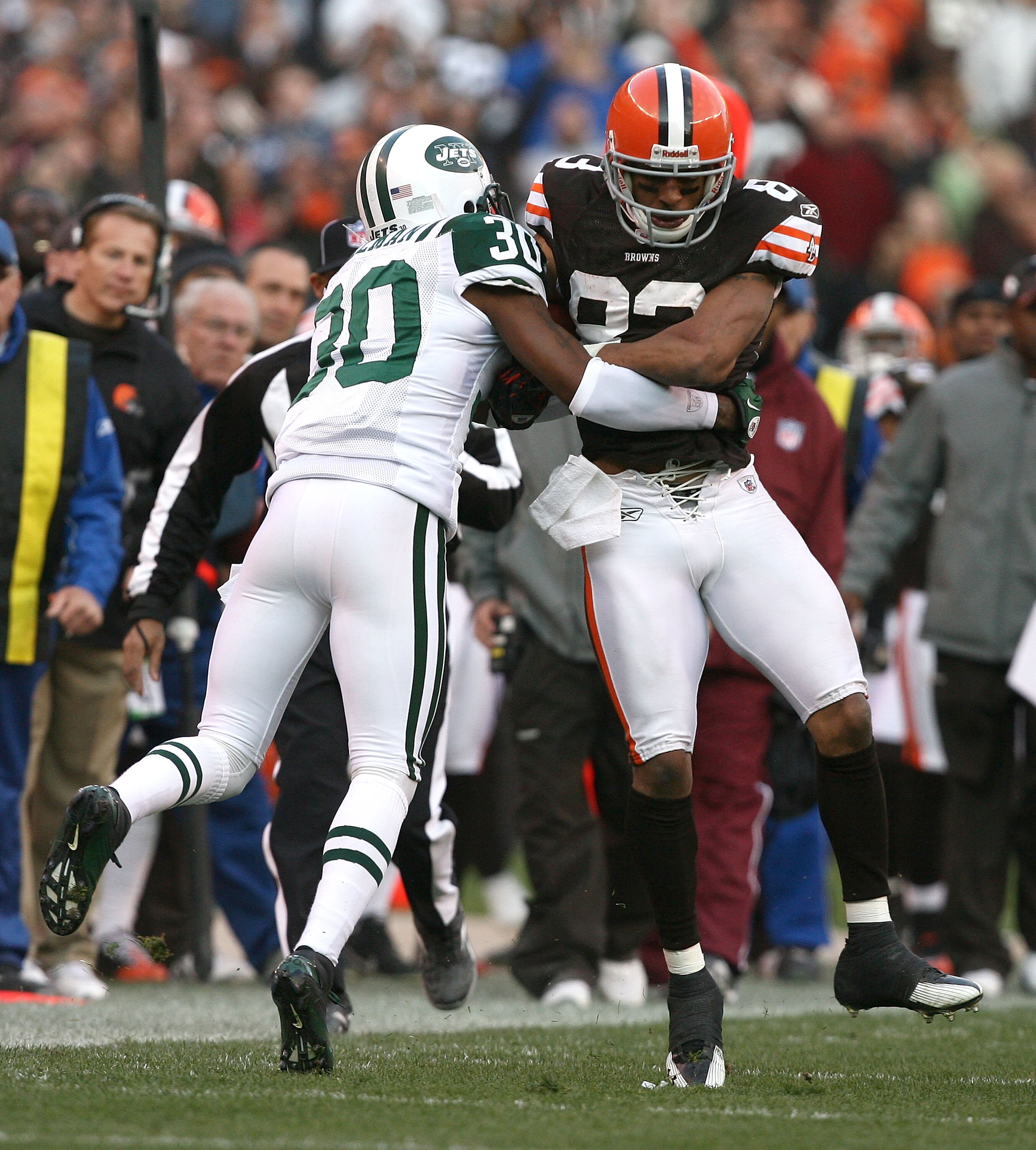 CLEVELAND - NOVEMBER 14:  Wide receiver Chansi Stuckey #83 of the Cleveland Browns fumbles the ball as he is hit by cornerback Drew Coleman #30 the New York Jets at Cleveland Browns Stadium on November 14, 2010 in Cleveland, Ohio.  (Photo by Matt Sullivan