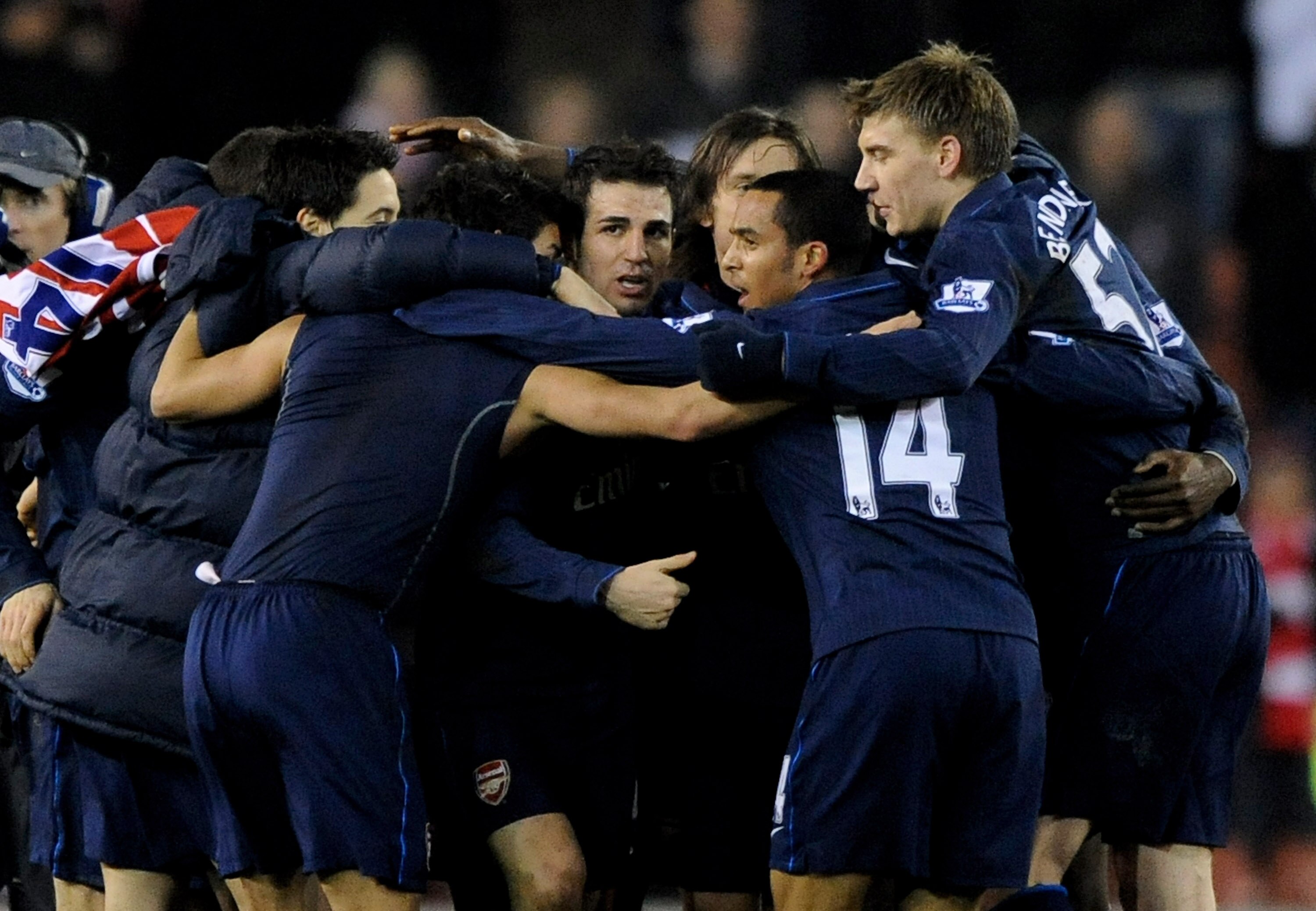 STOKE ON TRENT, ENGLAND - FEBRUARY 27:  Cesc Fabregas of Arsenal and his team mates form a huddle at the end of the Barclays Premier League match between Stoke City and Arsenal at The Britannia Stadium on February 27, 2010 in Stoke on Trent, England.  (Ph