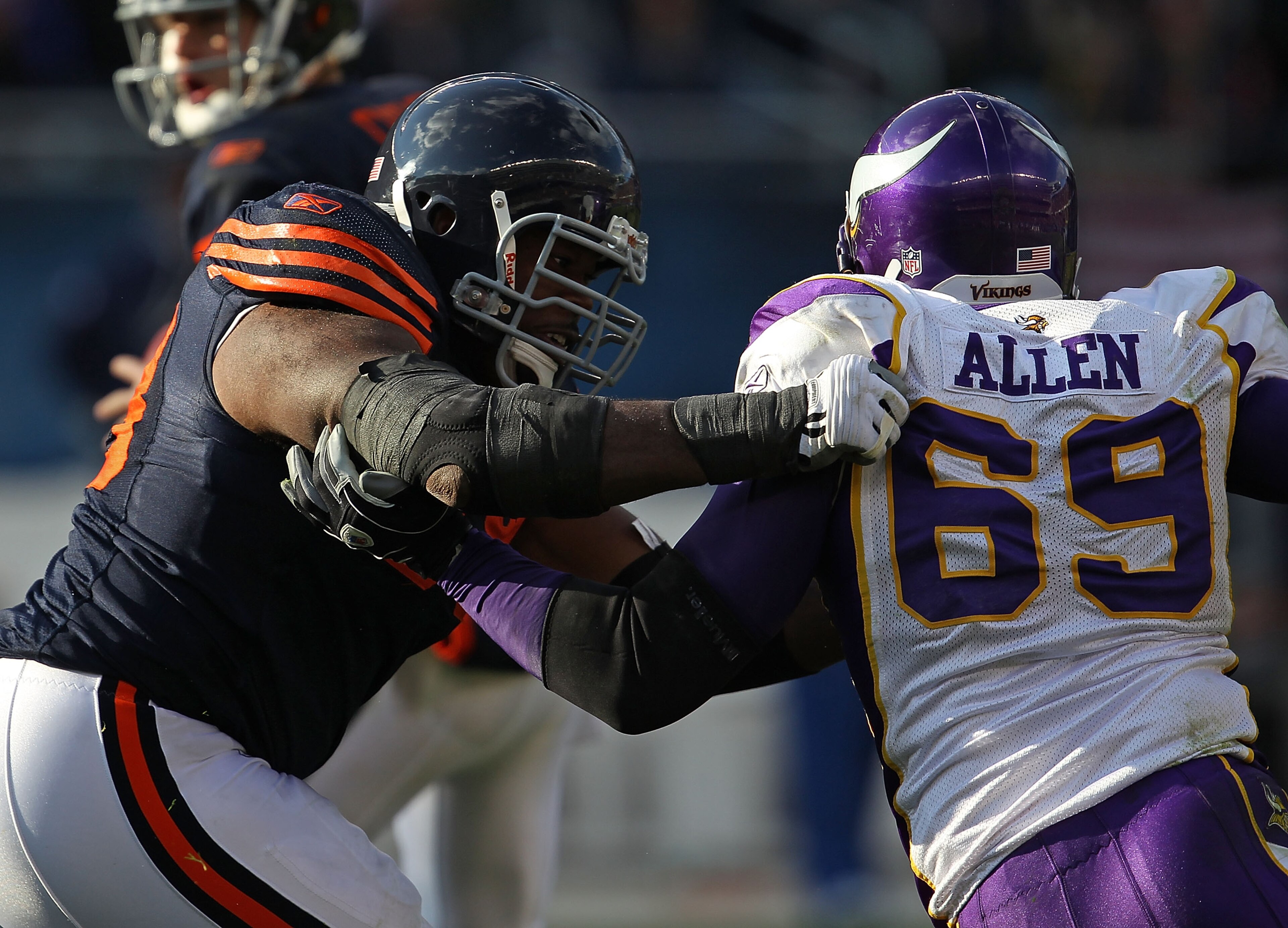 CHICAGO - NOVEMBER 14: Frank Omiyale #68 of the Chicago Bears grabs Jared Allen #69 of the Minnesota Vikings at Soldier Field on November 14, 2010 in Chicago, Illinois. The Bears defeated the Vikings 27-13. (Photo by Jonathan Daniel/Getty Images) CHICAGO - NOVEMBER 14: Frank Omiyale #68 of the Chicago Bears grabs Jared Allen #69 of the Minnesota Vikings at Soldier Field on November 14, 2010 in Chicago, Illinois. The Bears defeated the Vikings 27-13. (Photo by Jonathan Daniel/Getty Images)