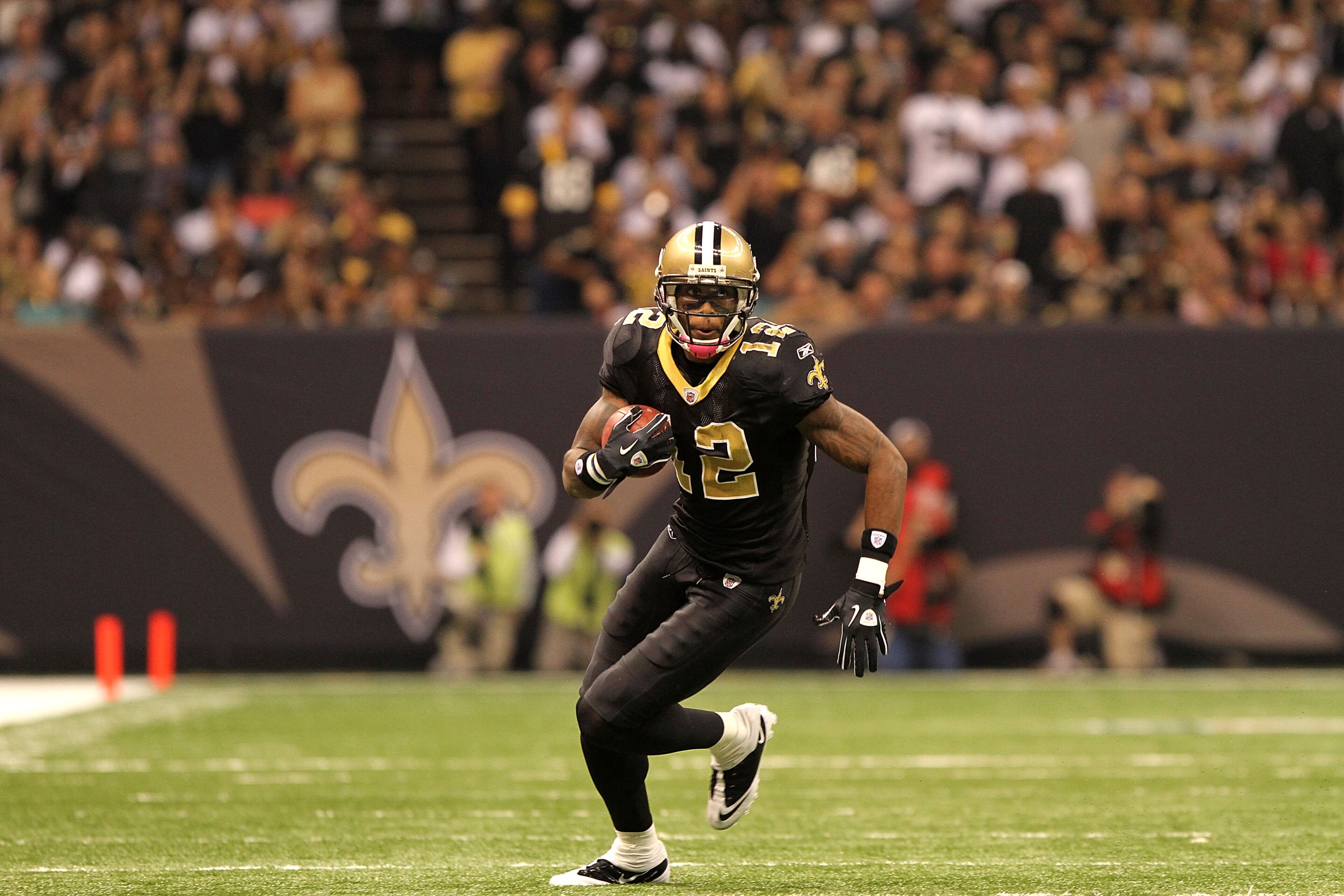 NEW ORLEANS, LA - OCTOBER 31: Marques Colston #12 of the New Orleans Saints in action during the game against the Pittsburgh Steelers at the Louisiana Superdome on October 31, 2010 in New Orleans, Louisiana. (Photo by Matthew Sharpe/Getty Images)
