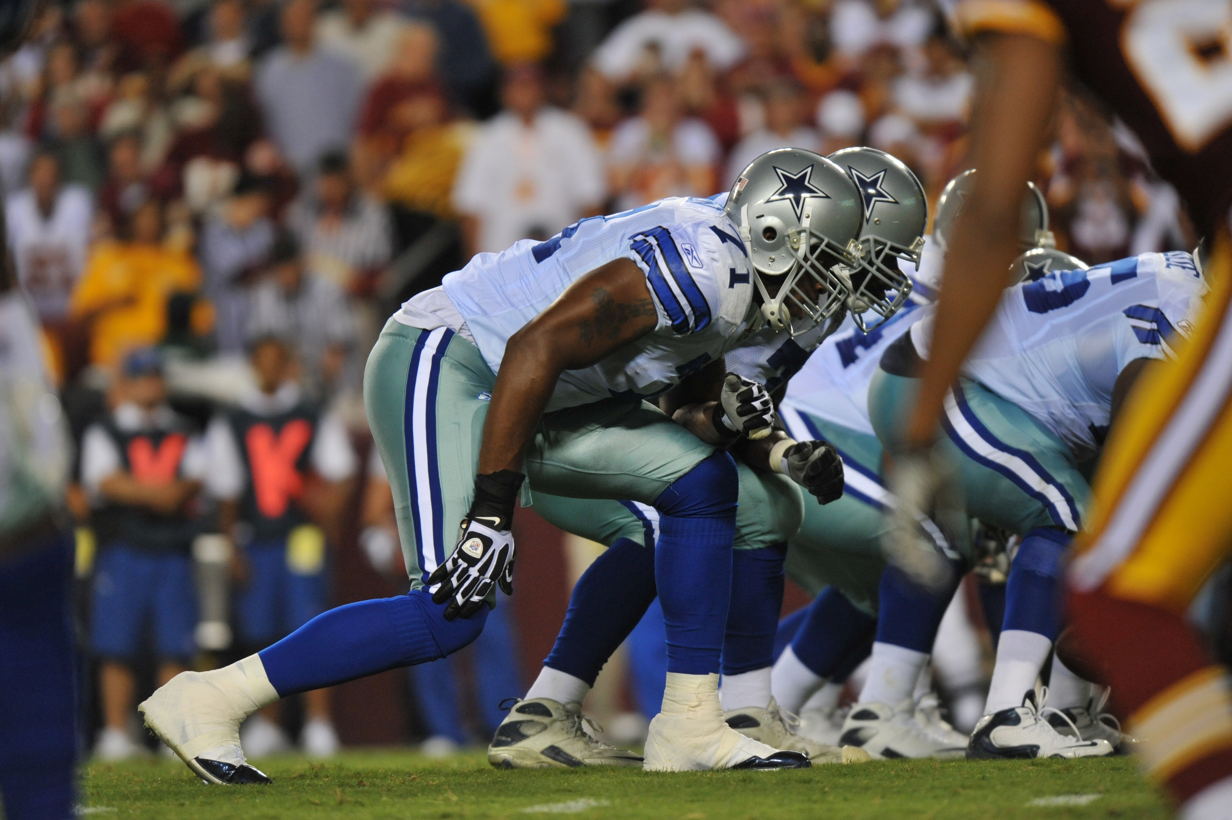 LANDOVER - SEPTEMBER 12:  Alex Barron #71 of the Dallas Cowboys defends during the NFL season opener against the Washington Redskins at FedExField on September 12, 2010 in Landover, Maryland. The Redskins defeated the Cowboys 13-7. (Photo by Larry French/