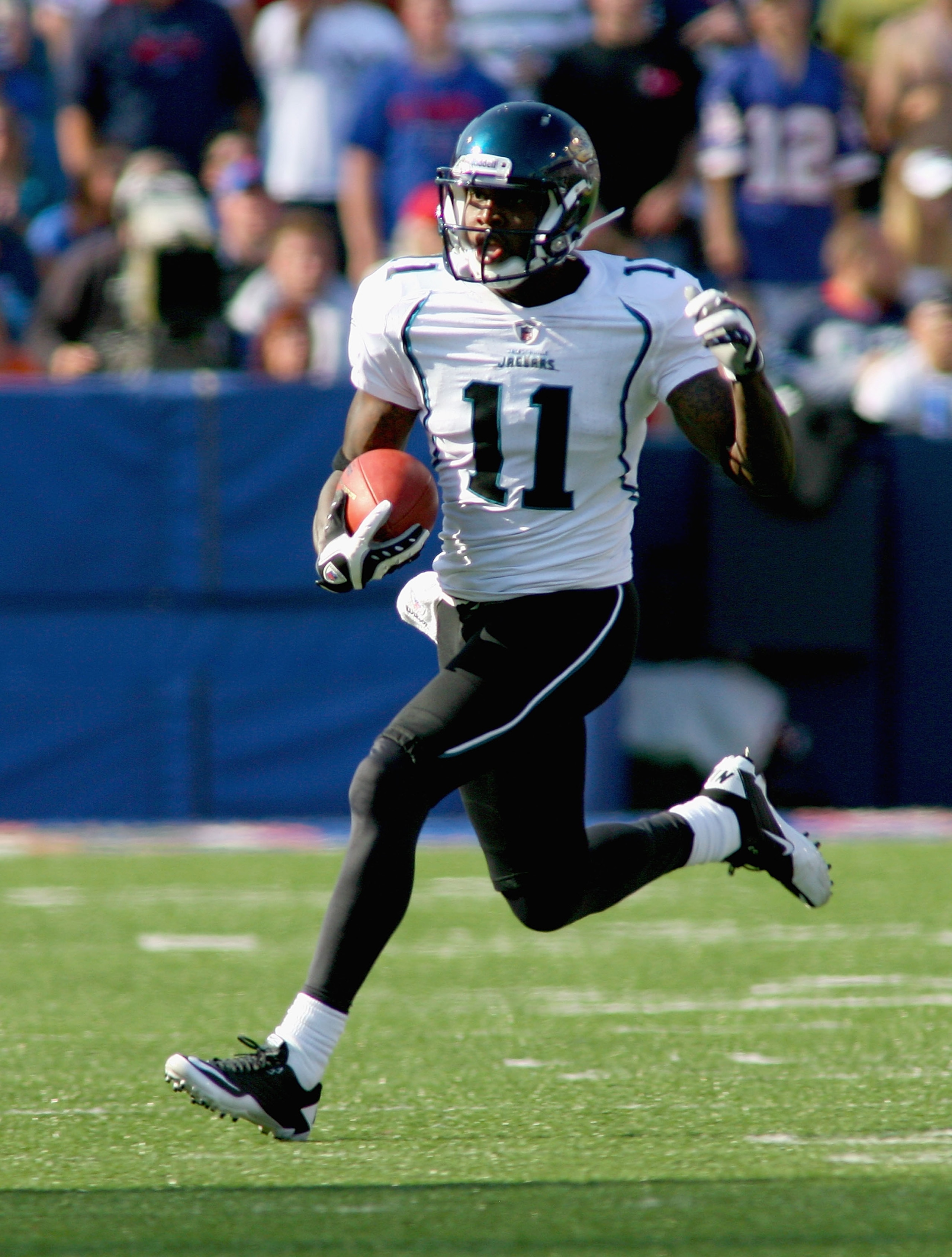 ORCHARD PARK, NY - OCTOBER 10: Mike Sims-Walker #11 of the Jacksonville Jaguars runs after a catch against the Buffalo Bills at Ralph Wilson Stadium on October 10, 2010 in Orchard Park, New York. Jacksonville won 36-26. (Photo by Rick Stewart/Getty Images ORCHARD PARK, NY - OCTOBER 10: Mike Sims-Walker #11 of the Jacksonville Jaguars runs after a catch against the Buffalo Bills at Ralph Wilson Stadium on October 10, 2010 in Orchard Park, New York. Jacksonville won 36-26. (Photo by Rick Stewart/Getty Images