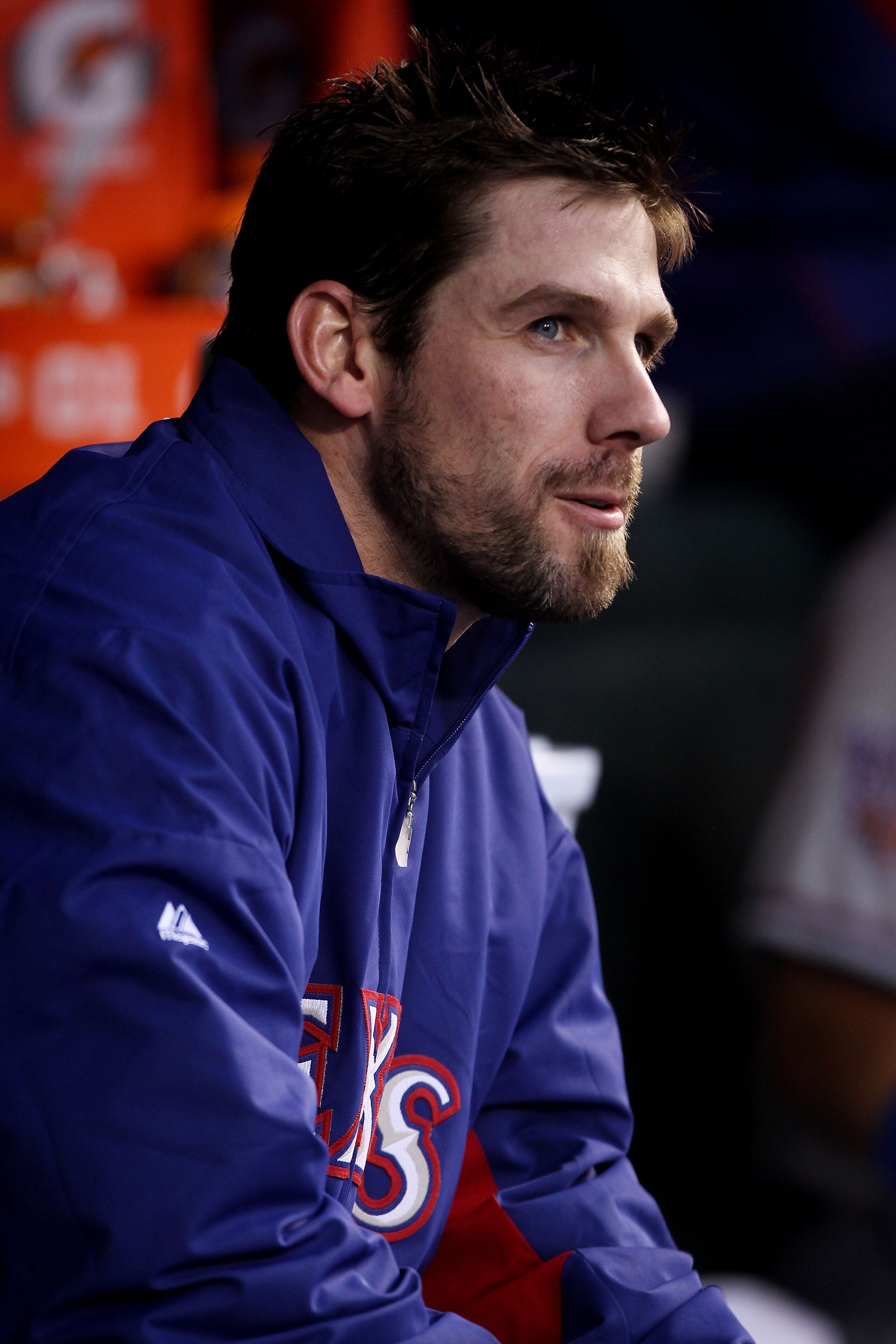 SAN FRANCISCO - OCTOBER 27:  Cliff Lee #33 of the Texas Rangers looks on from the dugout against the San Francisco Giants in Game One of the 2010 MLB World Series at AT&T Park on October 27, 2010 in San Francisco, California.  (Photo by Jed Jacobsohn/Gett