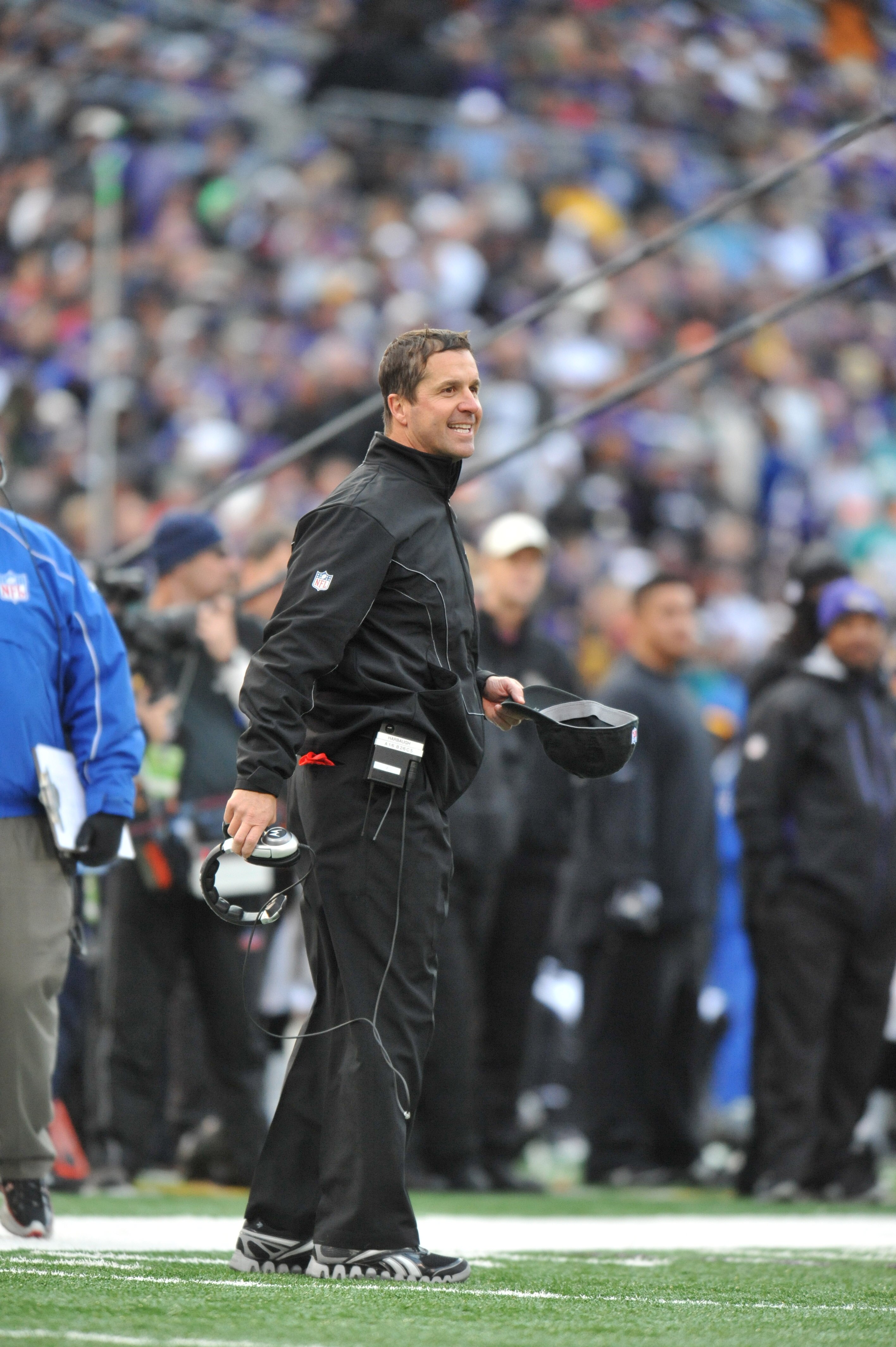 BALTIMORE, MD - NOVEMBER 7:  Head coach John Harbaugh of the Baltimore Ravens smiles during the game against the Miami Dolphins at M&T Bank Stadium on November 7, 2010 in Baltimore, Maryland. The Ravens defeated the Dolphins 26-10. (Photo by Larry French/