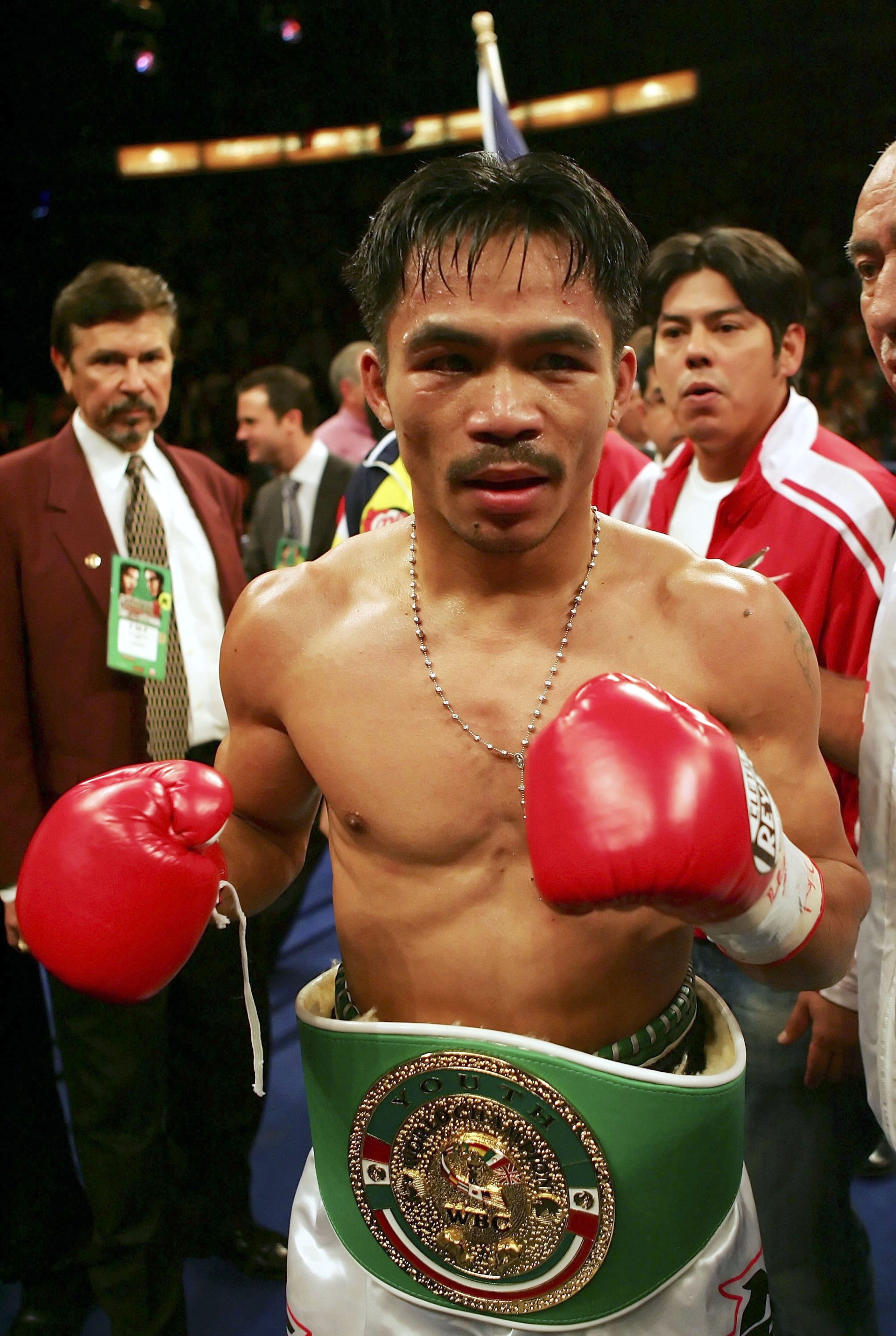 LAS VEGAS - NOVEMBER 18: Manny Pacquiao of the Philippines celebrates his knockout victory against Erik Morales after their super featherweight bout at the Thomas & Mack Center on November 18, 2006 in Las Vegas, Nevada. Pacquiao knocked out Morales in th LAS VEGAS - NOVEMBER 18: Manny Pacquiao of the Philippines celebrates his knockout victory against Erik Morales after their super featherweight bout at the Thomas & Mack Center on November 18, 2006 in Las Vegas, Nevada. Pacquiao knocked out Morales in th