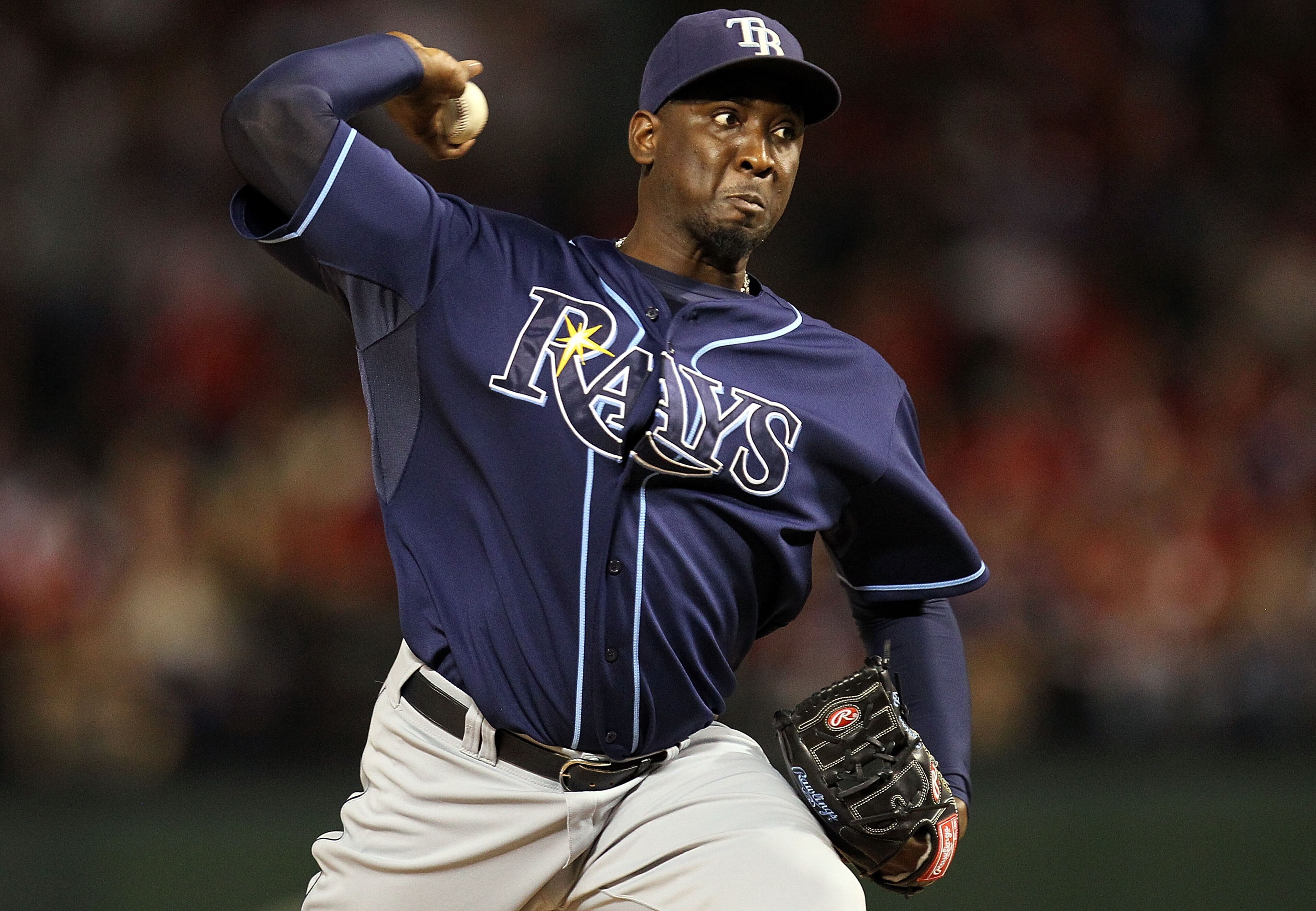 ARLINGTON, TX - OCTOBER 09:  Pitcher Rafael Soriano #29 of the Tampa Bay Rays throws against the Texas Rangers during game 3 of the ALDS at Rangers Ballpark in Arlington on October 9, 2010 in Arlington, Texas.  (Photo by Ronald Martinez/Getty Images)