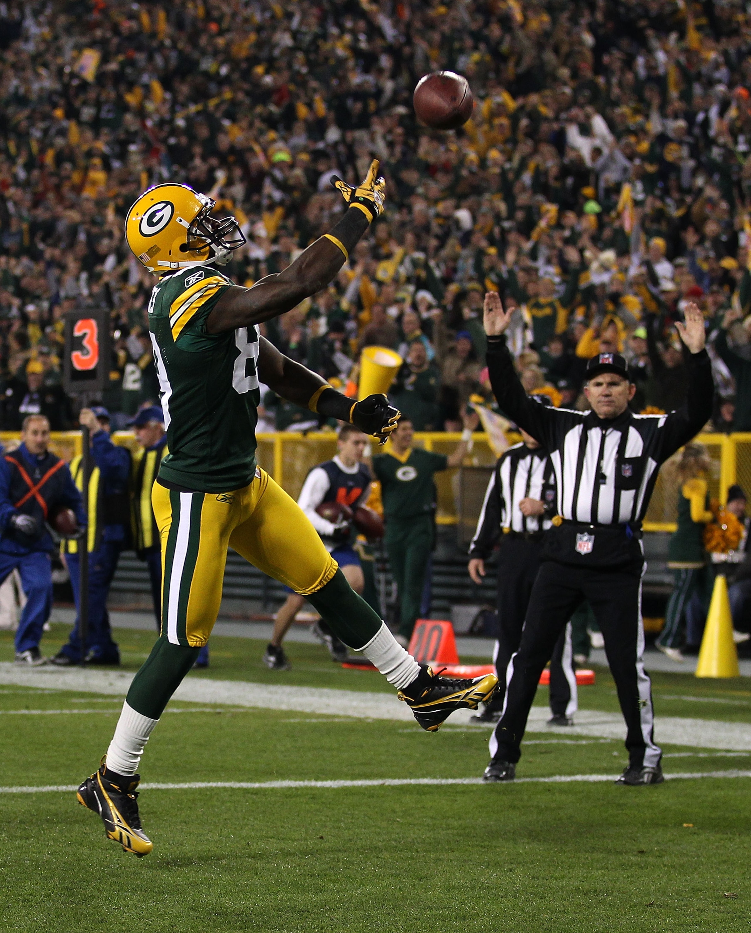 GREEN BAY, WI - NOVEMBER 07: James Jones #89 of the Green Bay Packers throws the ball into the air after scoring a touchdown against the Dallas Cowboys at Lambeau Field on November 7, 2010 in Green Bay, Wisconsin. (Photo by Jonathan Daniel/Getty Images)