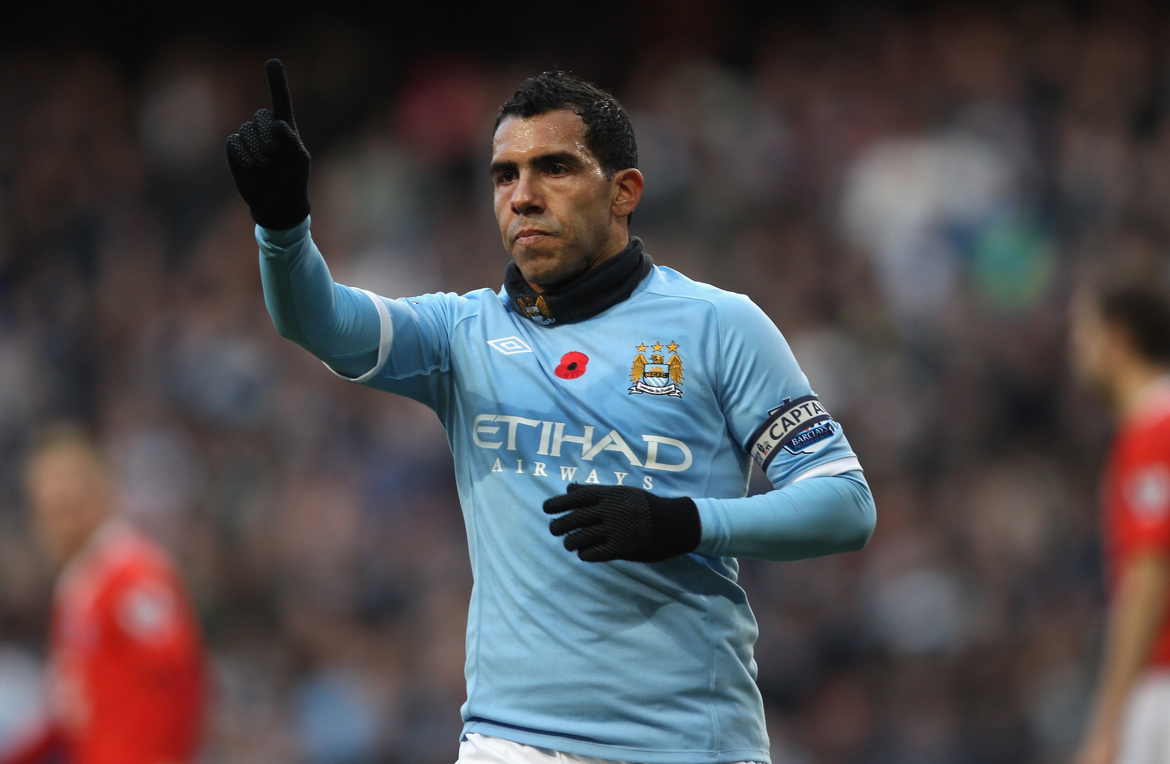 MANCHESTER, ENGLAND - NOVEMBER 13:  Carlos Tevez of Manchester City disputes his disallowed goal with the linesman during the Barclays Premier League match between Manchester City and Birmingham City at City of Manchester Stadium on November 13, 2010 in M