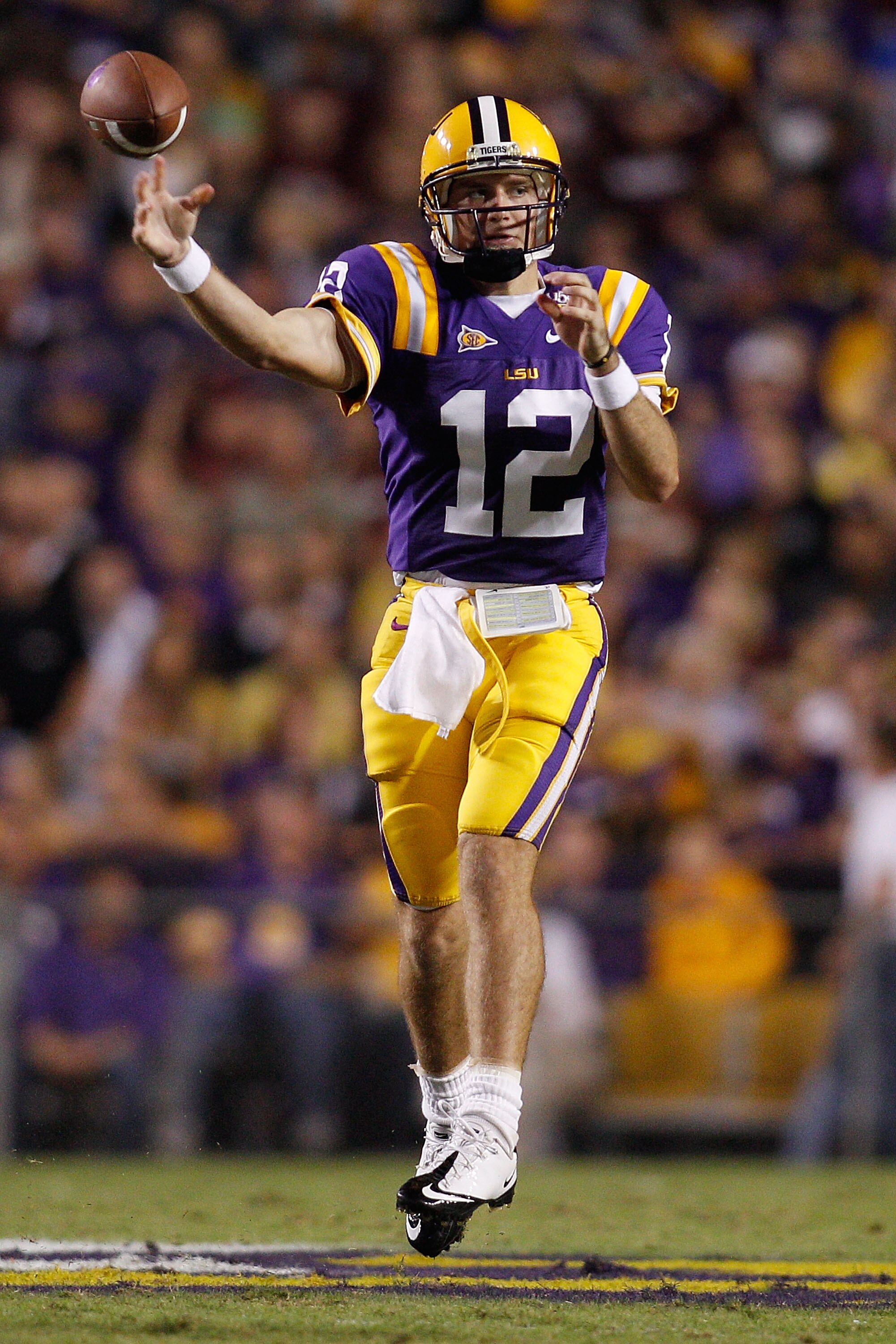 BATON ROUGE, LA - NOVEMBER 13:  Quarterback Jarrett Lee #12 of the Louisiana State University Tigers throws a pass against the University of Louisiana-Monroe Warhawks at Tiger Stadium on November 13, 2010 in Baton Rouge, Louisiana.  (Photo by Chris Grayth