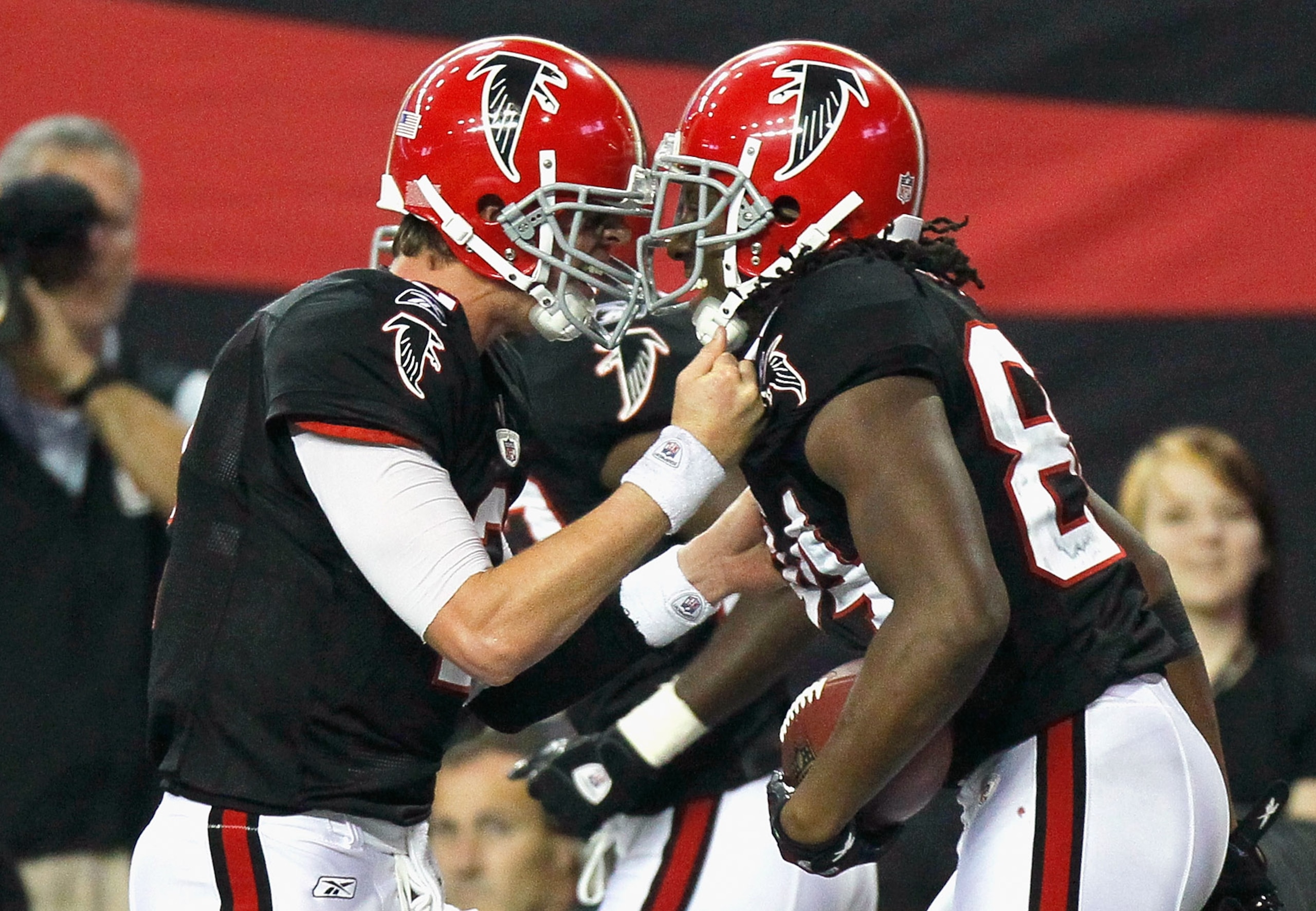 ATLANTA - NOVEMBER 11:  Quarterback Matt Ryan #2 and Roddy White #84 of the Atlanta Falcons react after White's touchdown reception in the final seconds against the Baltimore Ravens at Georgia Dome on November 11, 2010 in Atlanta, Georgia.  (Photo by Kevi