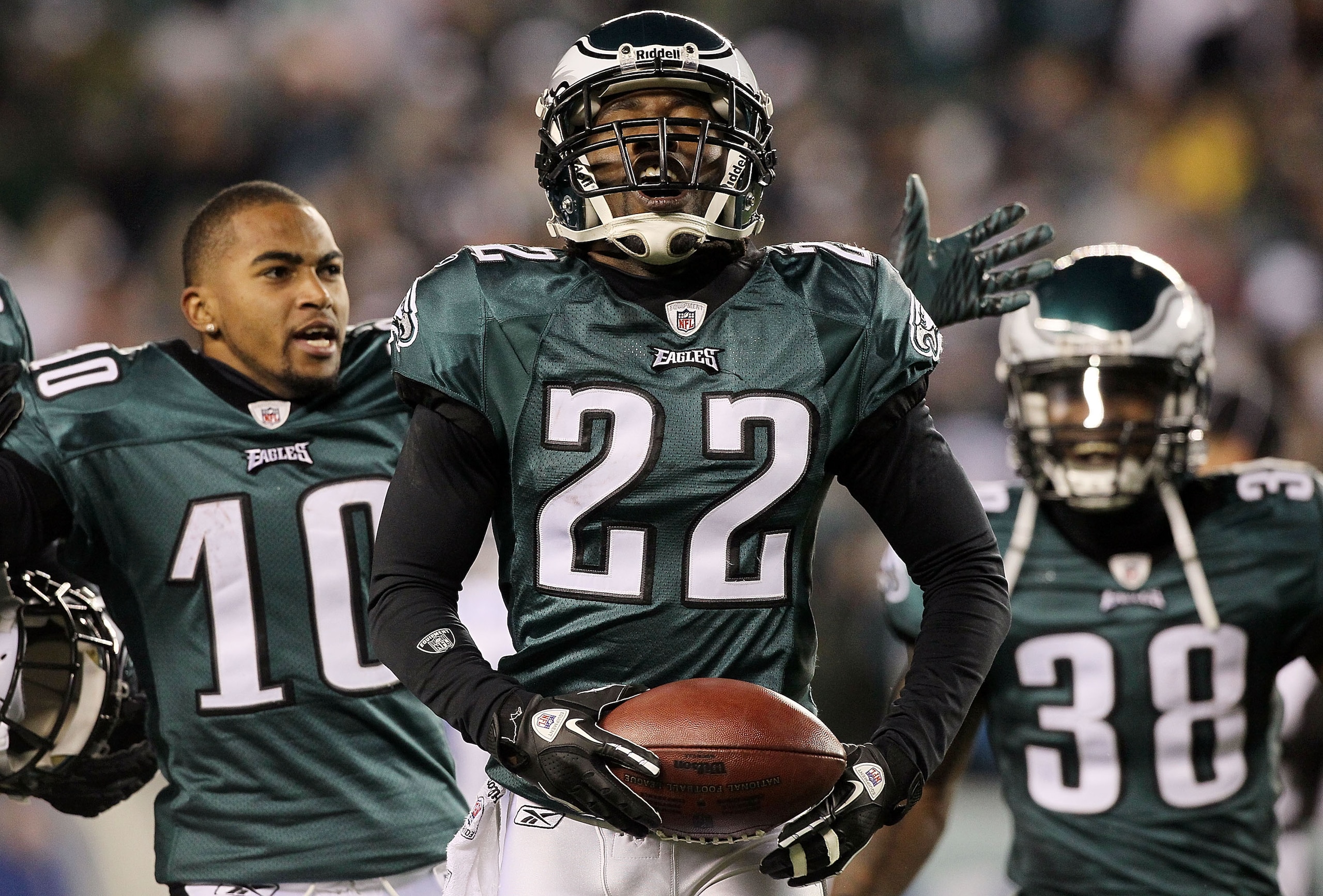 PHILADELPHIA - NOVEMBER 07:  Asante Samuel #22 of the Philadelphia Eagles celebrates his last minute interception that clinched their victory against the Indianapolis Colts with teammates DeSean Jackson #10 and Jorrick Calvin #38 on November 7, 2010 at Li