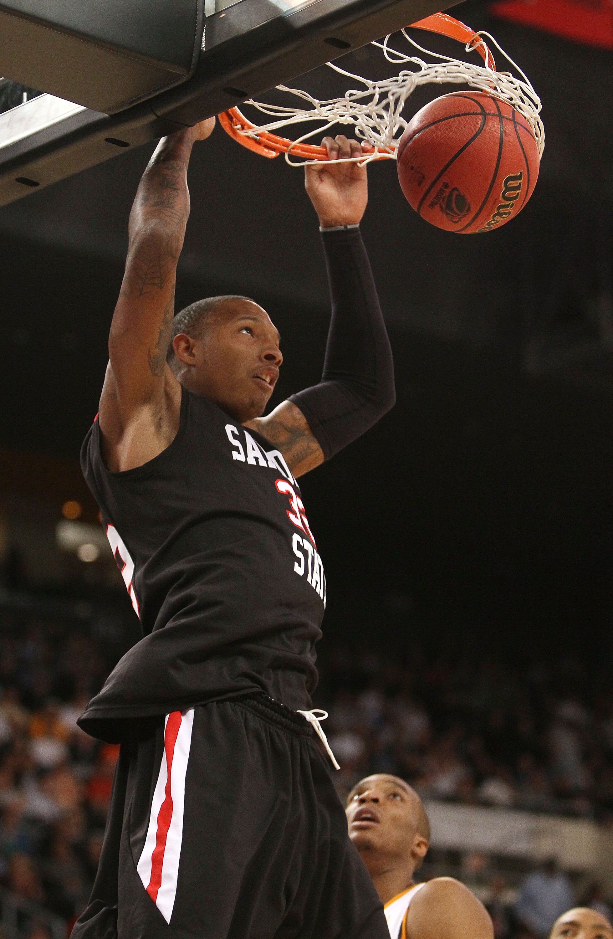PROVIDENCE, RI - MARCH 18:  Billy White #32 of the San Diego State Aztecs dunks the ball in the first half against the Tennessee Volunteers during the first round of the 2010 NCAA men's basketball tournament on March 18, 2010 at the Dunkin Donuts Arena in