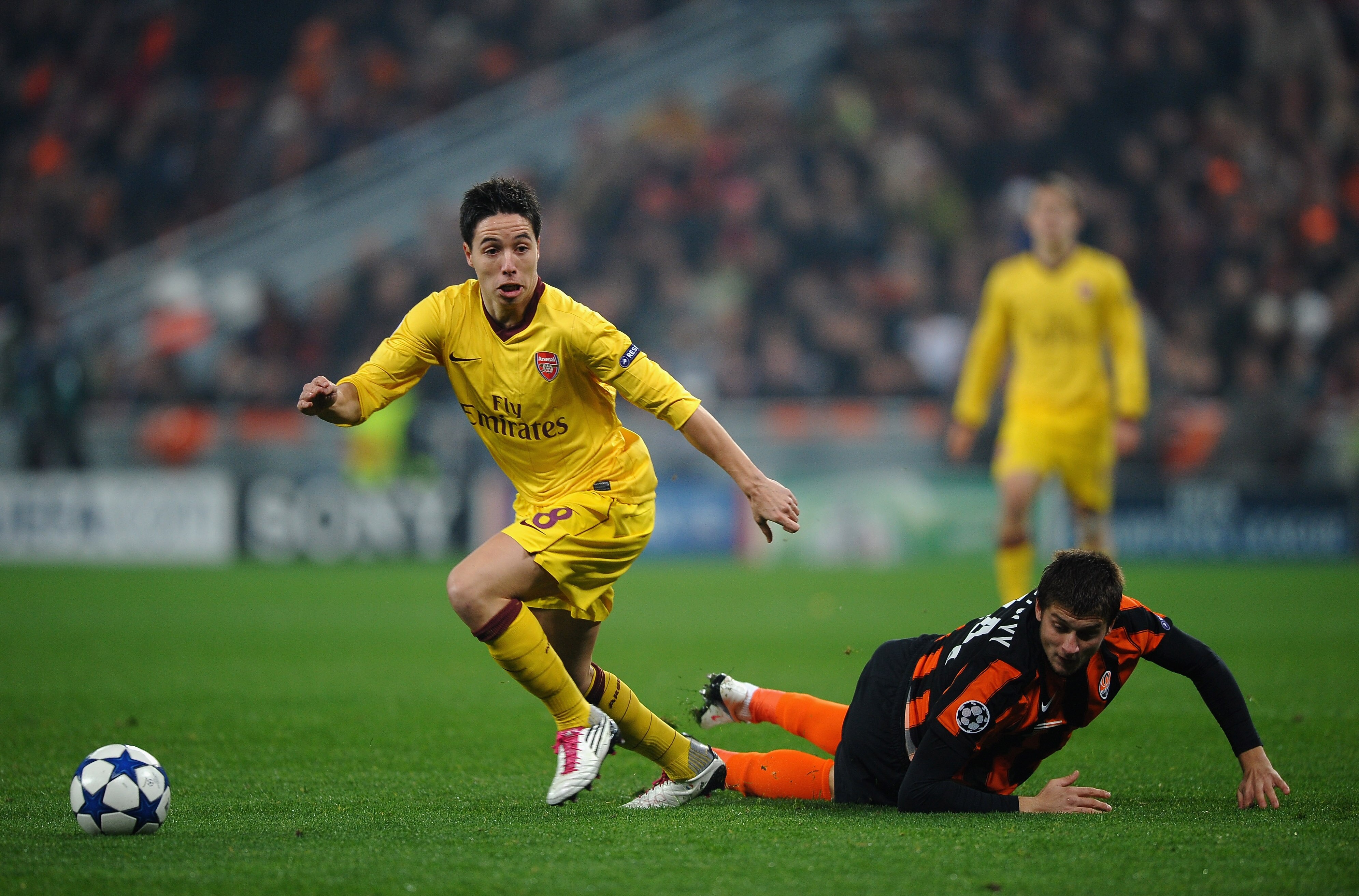 DONETSK, UKRAINE - NOVEMBER 03:  Samir Nasri of Arsenal battles with Yaroslav Rakitskiy of FC Shakhtar Donetsk during the Champions League Group H match between FC Shakhtar Donetsk and Arsenal at the Donbass Arena on November 3, 2010 in Donetsk, Ukraine. 