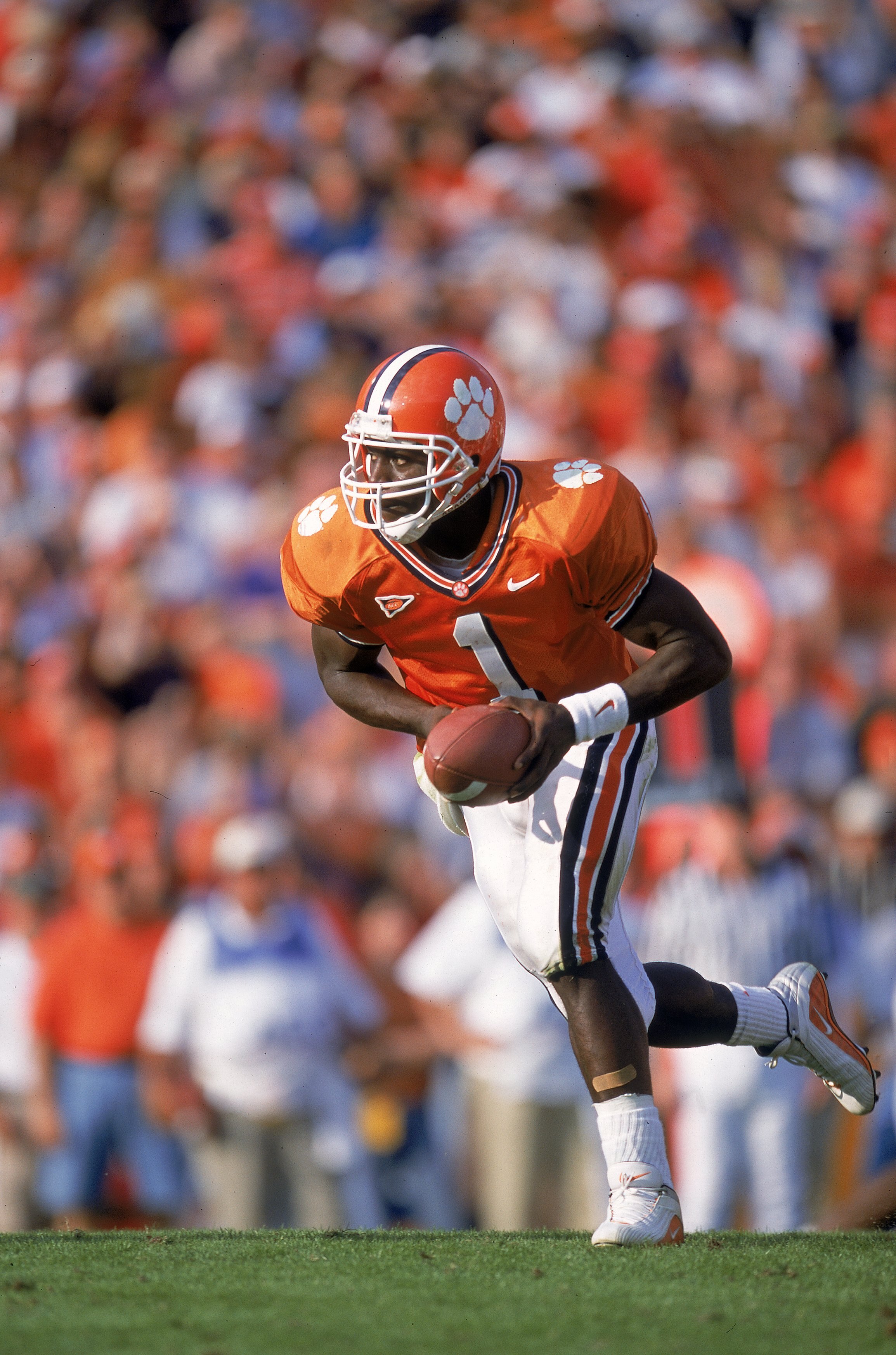 28 Oct 2000: Quarterback Woodrow Dantzler #1 of the Clemson Tigers scrambles as he look to pass the ball during the game against the Georgia Tech Yellow Jackets in Clemson, South Carolina. The Yellow  Jackets defeated the Tigers 31-28.Mandatory Credit: Cr