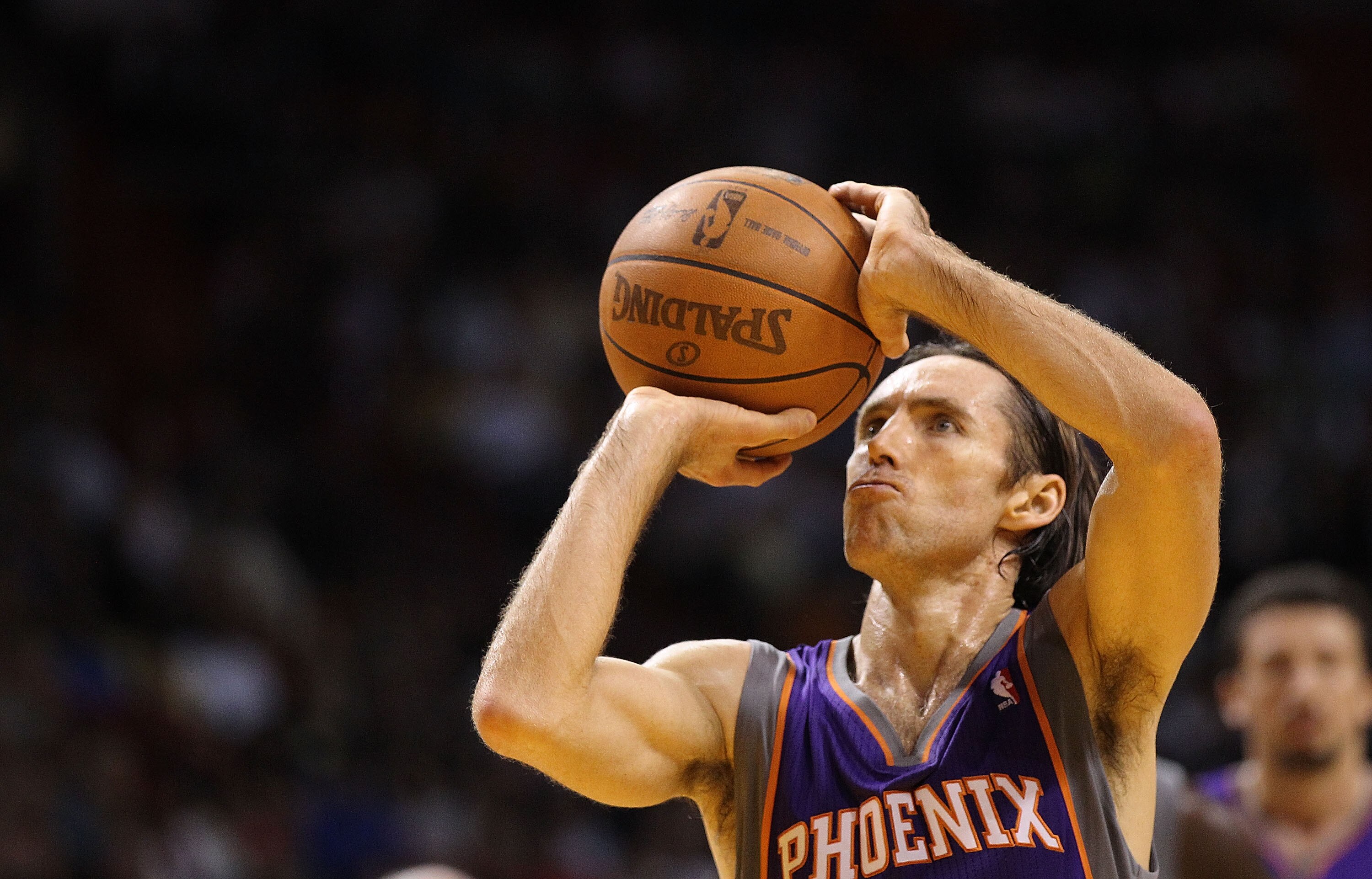 MIAMI - NOVEMBER 17:  Steve Nash #13  of the Phoenix Suns shoots a freethrow during a game against the  Miami Heat at American Airlines Arena on November 17, 2010 in Miami, Florida. NOTE TO USER: User expressly acknowledges and agrees that, by downloading